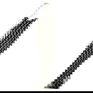 Vintage Chez Royale Beaded Evening Dress: Black and white zig zag beaded pattern on straight line long dress. Zippered back closure. Chez Royale label. Issued: 20th century Manufacturer: Chez Royale Country of Origin: China
