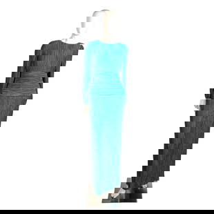 Vintage George F. Coutre Evening Dress, Size 4: Turquoise crimped polyester, banded waist evening dress. Open back with zipper closure and large satin bow with rhinestone enhancement. Issued: 20th century Manufacturer: George F. Country of Origin: