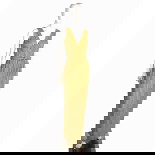 Vintage Gold Glitter Evening Dress: Sleek sleeveless gown with cross neck and ruffled edge. Braided rope belt and zippered back. Gown length 57". Issued: 20th century Country of Origin: United States