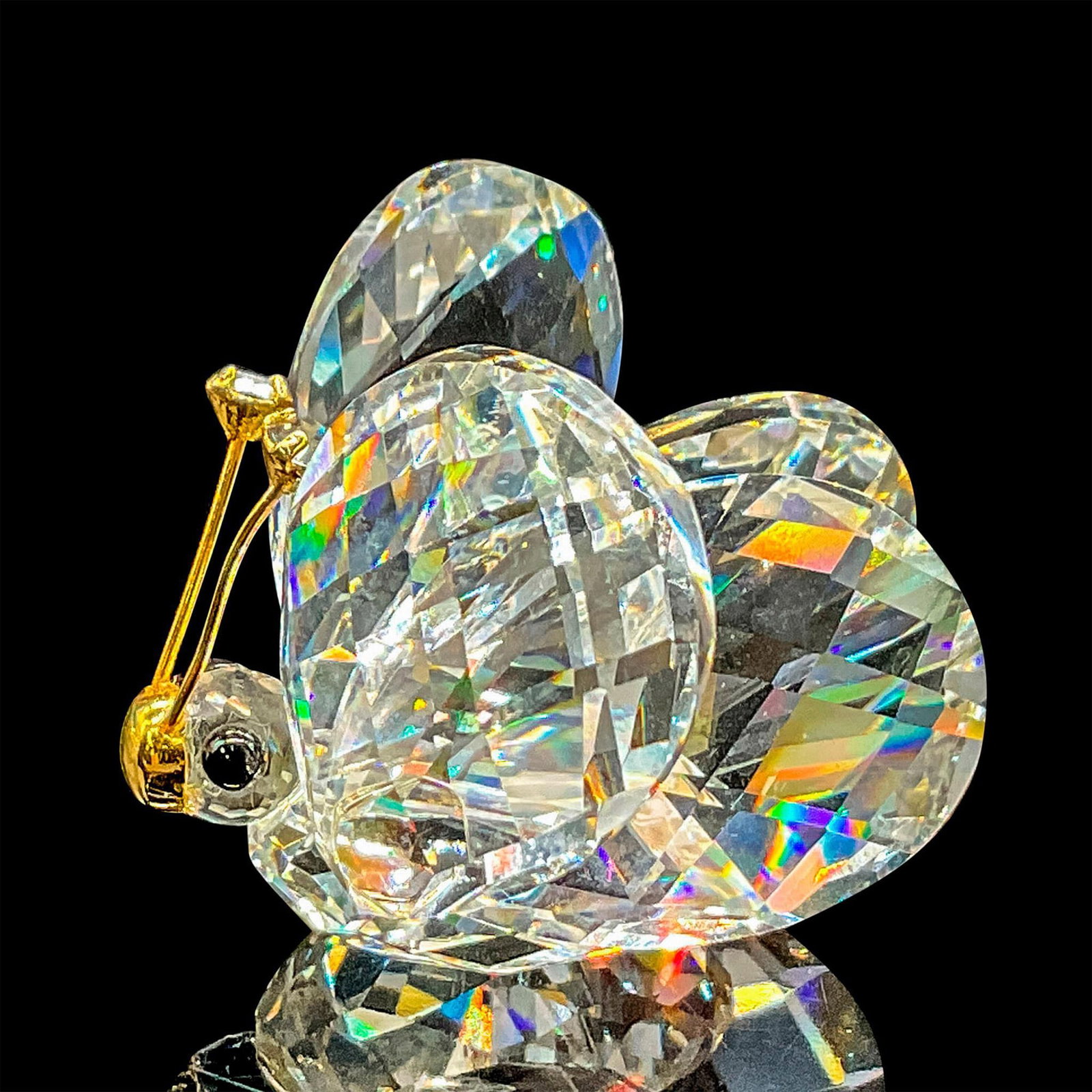 Swarovski Crystal Figurine, Butterfly with Gold Antennae: Brilliant clear crystal butterfly with crystal tipped gold antennae. Swarovski etched backstamp. Part of the In A Summer Meadow Collection. Swarovski etched mark. Includes original box 2.5"H x 3.25"di