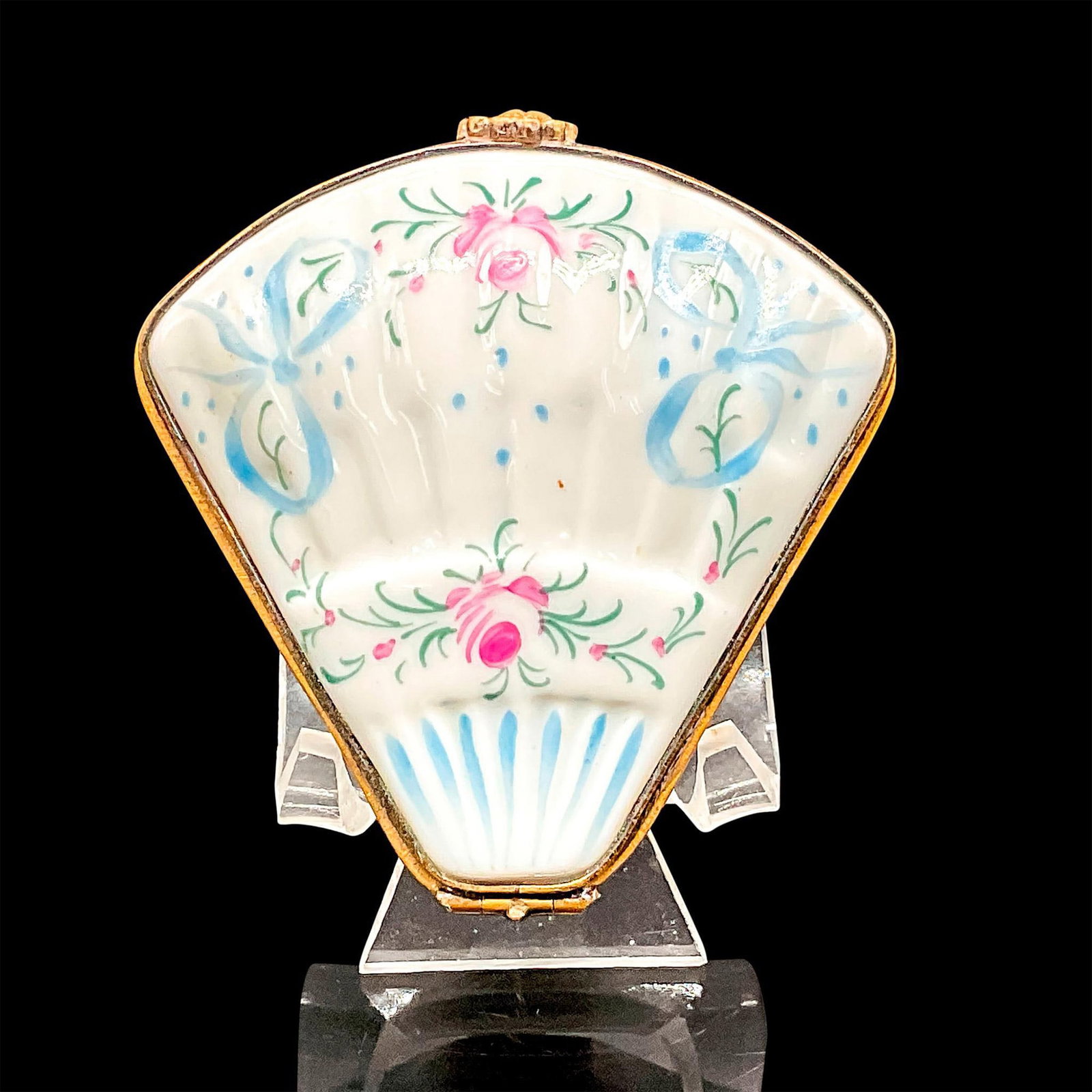 Limoges Porcelain Box, Hand Painted Fan-Shaped: Lovely fan-shaped hand painted porcelain jewelry box with brass flower fastener and decorated with pink flowers and blue ribbons. Marked to base, hand painted Limoges, D.D. 45. Dimensions: 2.75"L x 2.