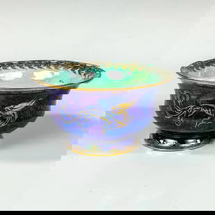 Wedgwood Dragon Lustre Bowl, Three Jewels: Decorated exterior with the Small Dragon pattern over a dark blue mottling underglaze. Mother of pearl interior with the Three Jewels pattern and guardian dragons. Wedgwood gilt Portland vase mark and
