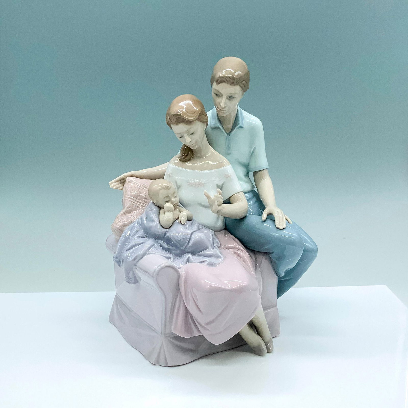 A Circle Of Love 1006986 - Lladro Porcelain Figurine: Glossy finish; Lladro backstamp. Artist: Joan Coderch Issued: 2003 Dimensions: 9.75"H x 7"W Manufacturer: Lladro Country of Origin: Spain