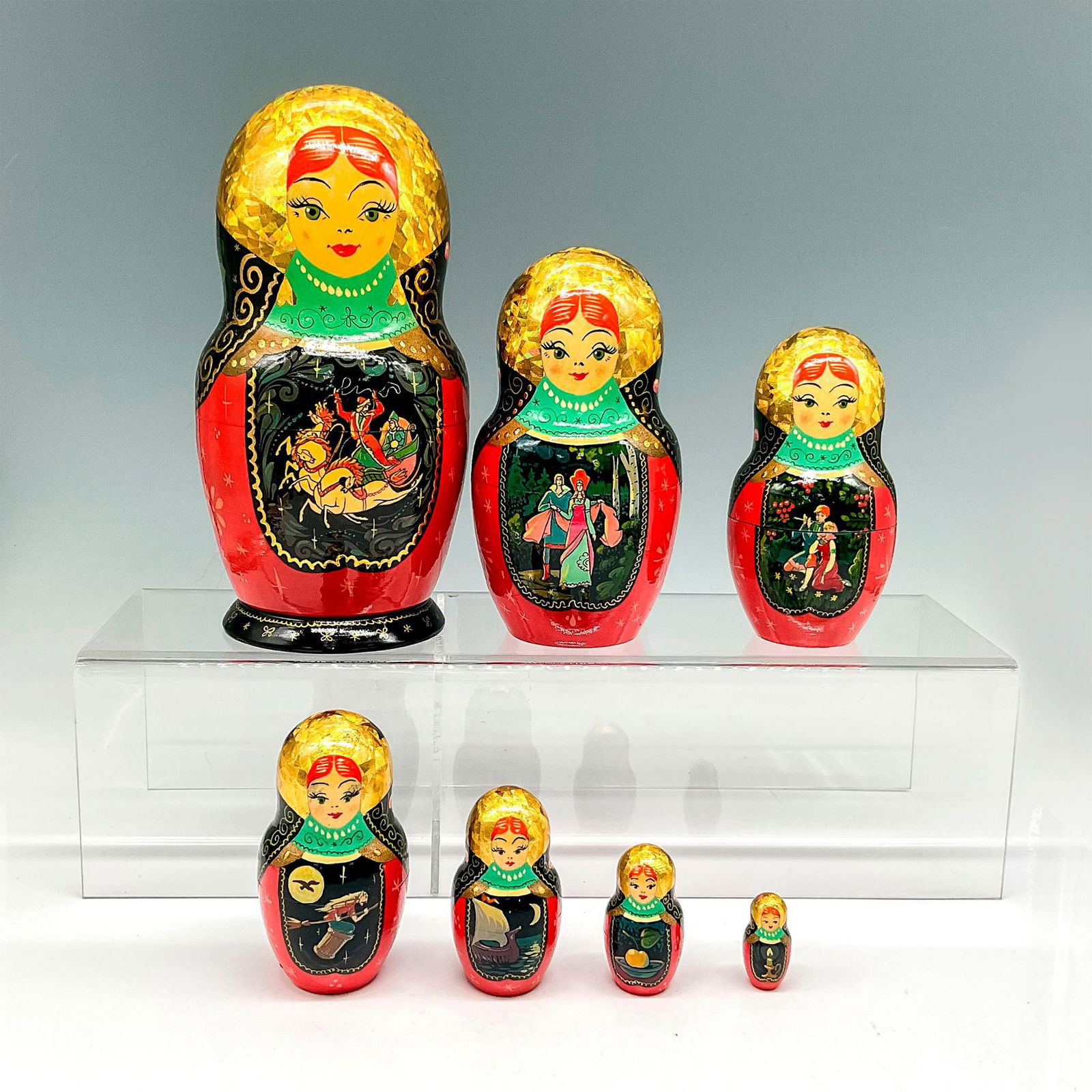 Vintage Hand Painted Russian Matryoshka Nesting Dolls: Intricately designed and painted nesting dolls. Florals and sleigh scene on 7 tiered dolls. Signed by artist A.Arefiev. Issued: 2004 Dimensions: 8.25"H x 4" dia. Country of Origin: Russia