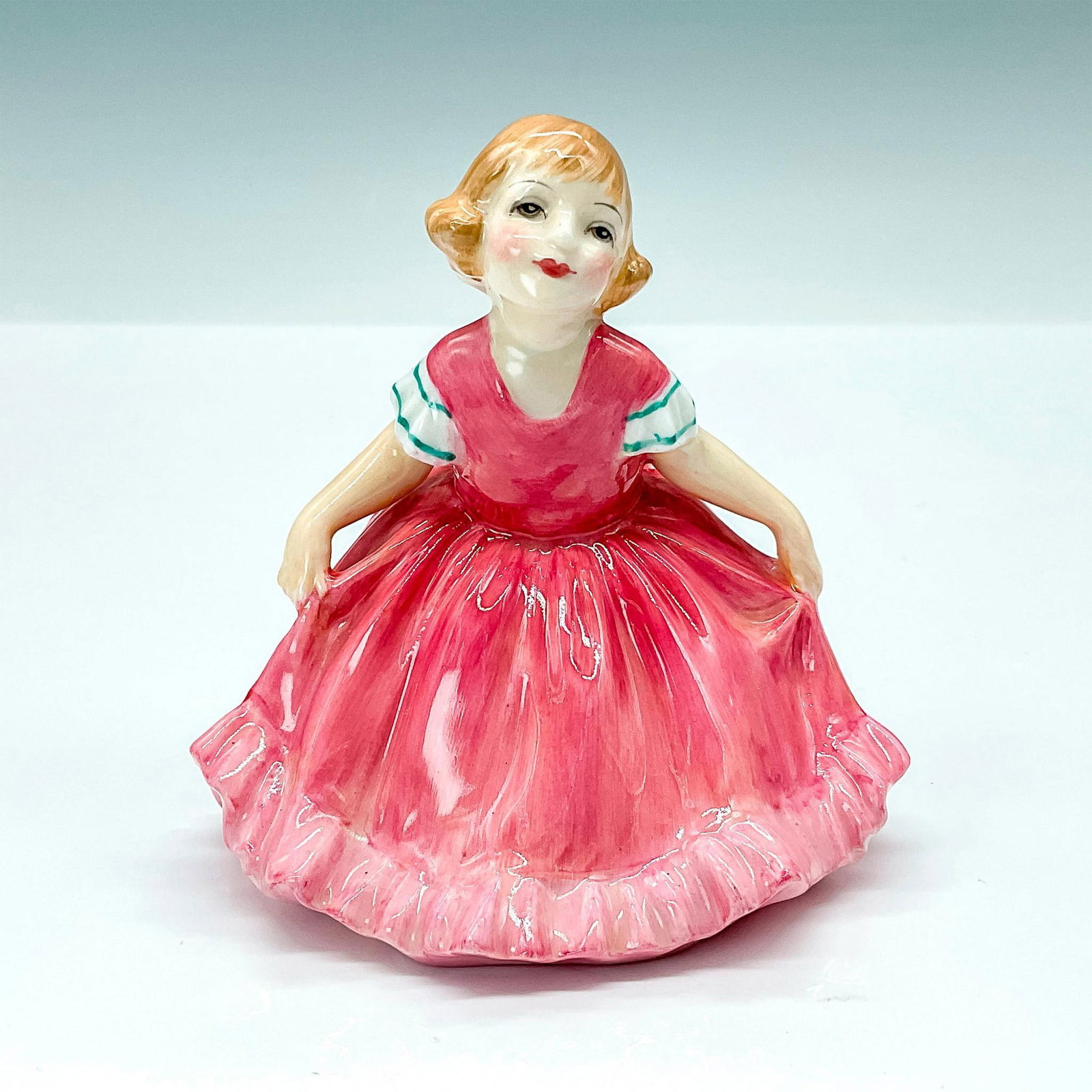 Daisy HN1961 - Royal Doulton Figurine: Artist: Leslie Harradine Issued: 1941 - 1949 Dimensions: 3.5"H Manufacturer: Royal Doulton Country of Origin: England