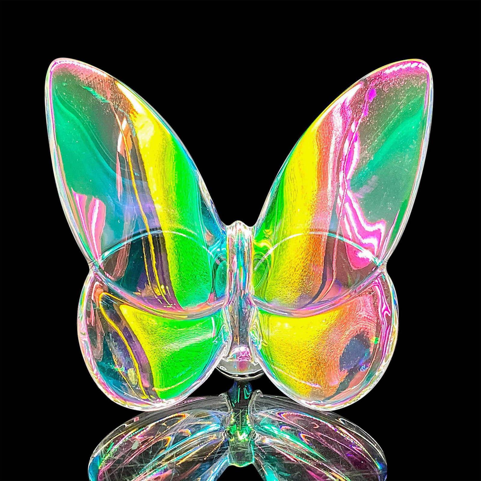 Baccarat Lucky Butterfly Multicolored: Poised to flutter off, the Baccarat crystal butterfly glints vibrantly with bright color. The wings fan out grandly, echoing the shape characteristic of the Amazonian breed. Baccarat backstamp. Dimens