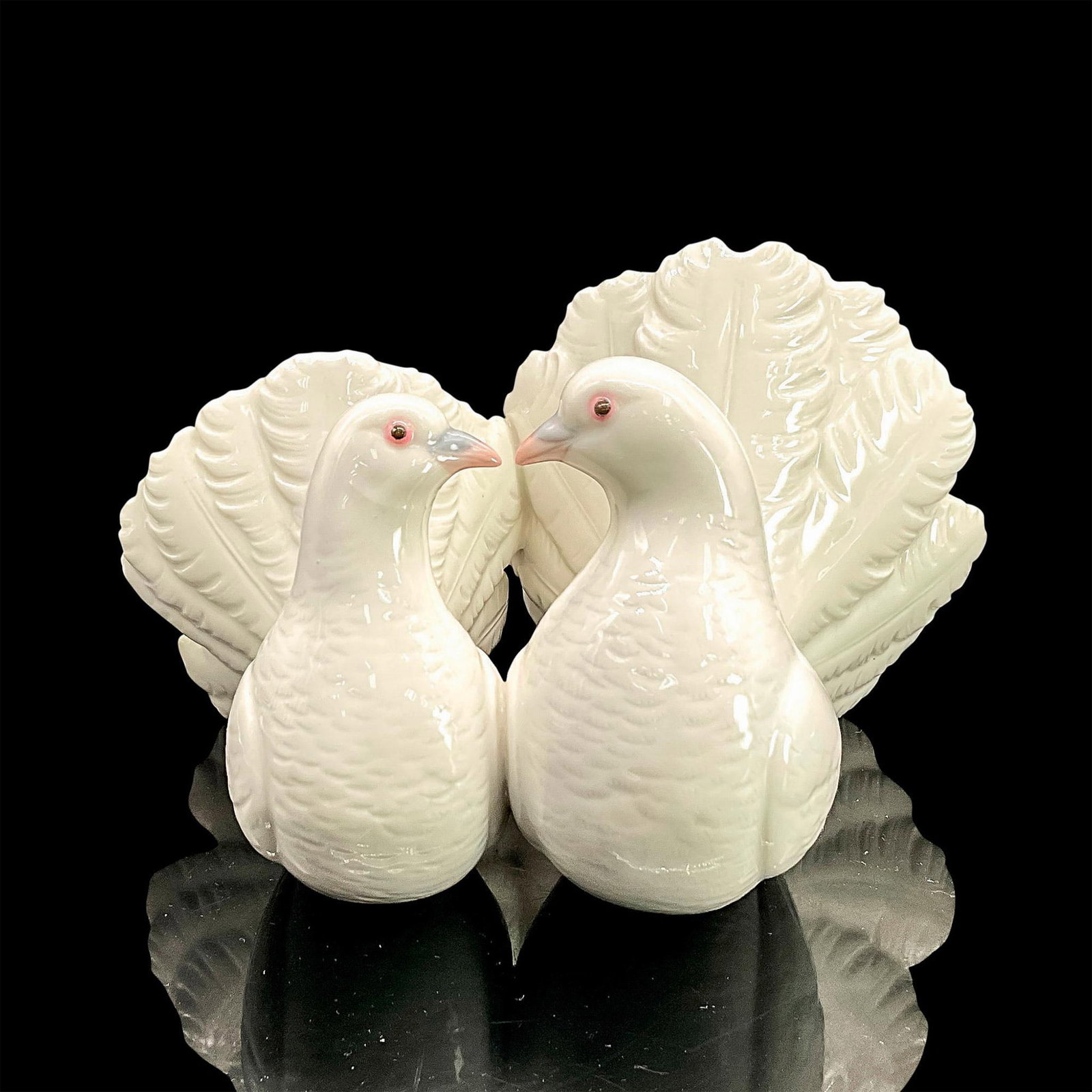 Couple Of Doves 1001169 - Lladro Porcelain Figurine: Glossy finish; Lladro backstamp. Artist: Antonio Ballester Issued: 1971 Dimensions: 4.75"H x 7.5"W Manufacturer: Lladro Country of Origin: Spain
