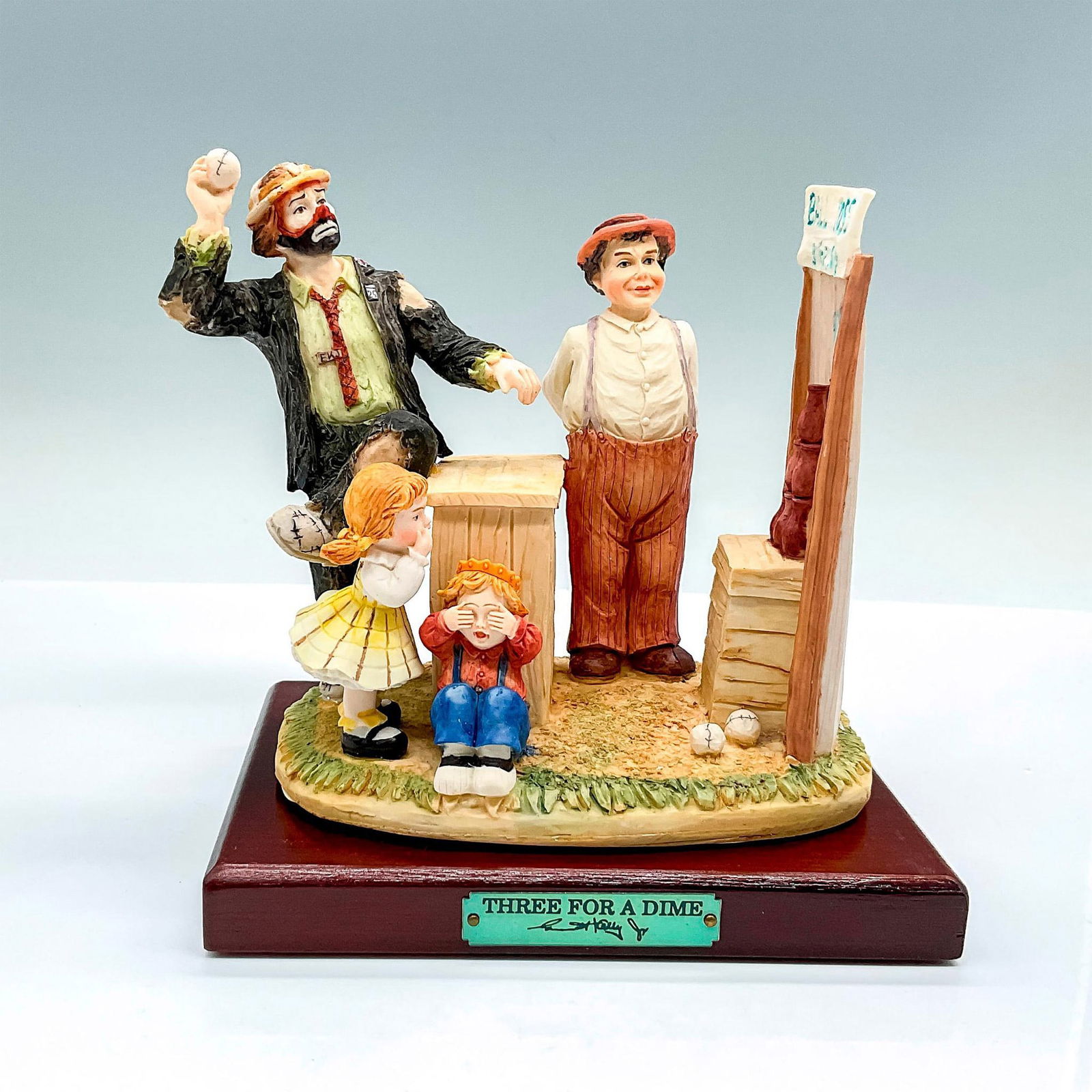 Flambro Emmett Kelly Jr. Figurine, Three For A Dime (1 of 5)