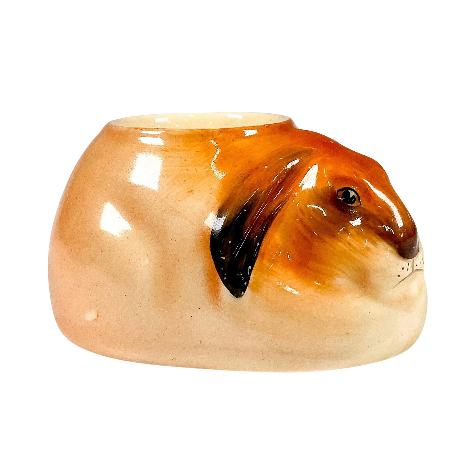 Royal Doulton Bunnykins Egg Cup D6034: Bunnykins seriesware. Glaze finish egg cup in the shape of a lop-eared rabbit. Painted in naturalistic coloration. Very short production period Bunnykins Breakfast set, comprising of 6 pieces due to w