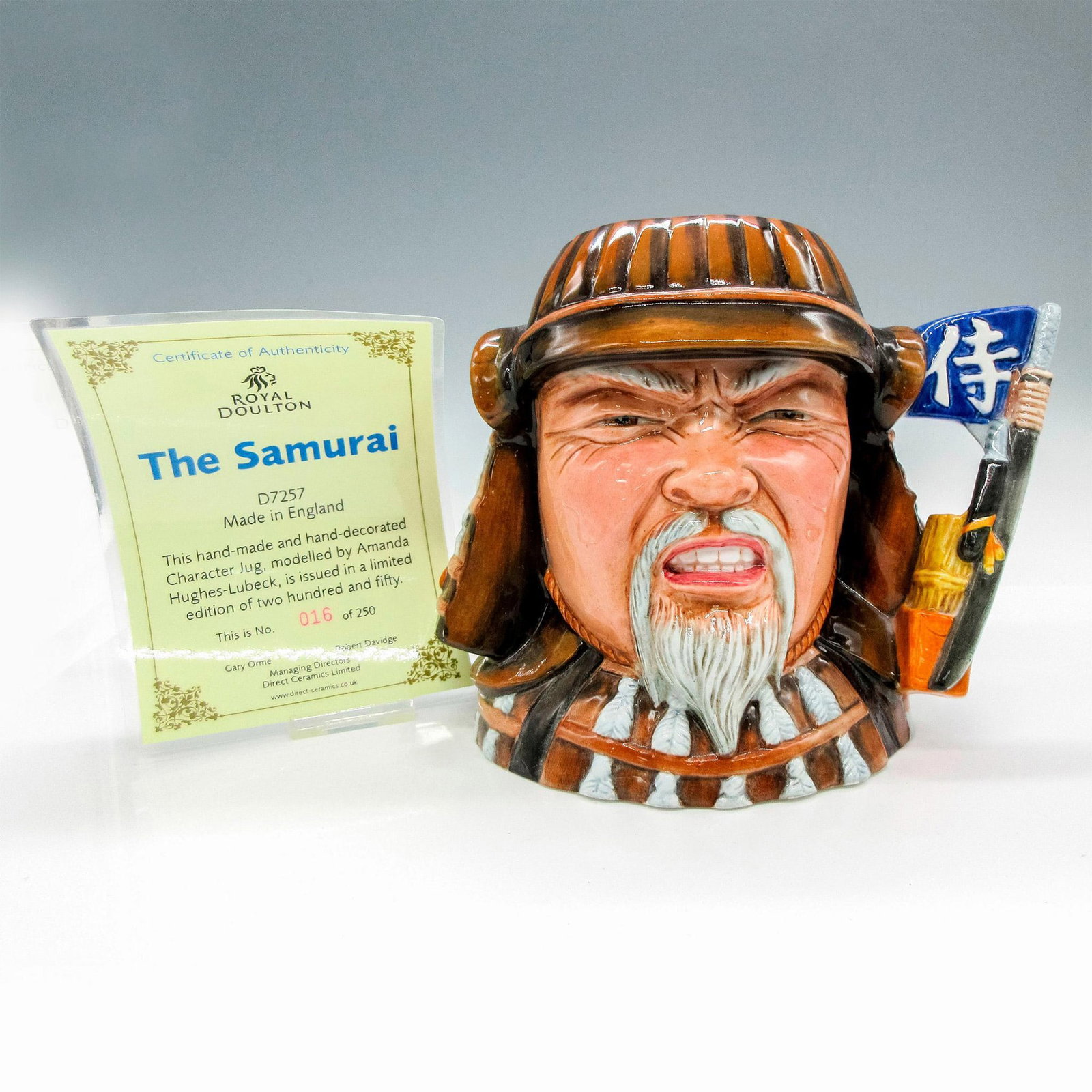 Samurai D7257 - Large - Royal Doulton Character Jug: Variation Two. Brown, grey, black, and white. Issued in 2006 in a limited edition series of 250. Series: Myths, Legends, and Fantasies. Royal Doulton backstamp. Artist: Amanda Hughes-Lubeck Issued: 20
