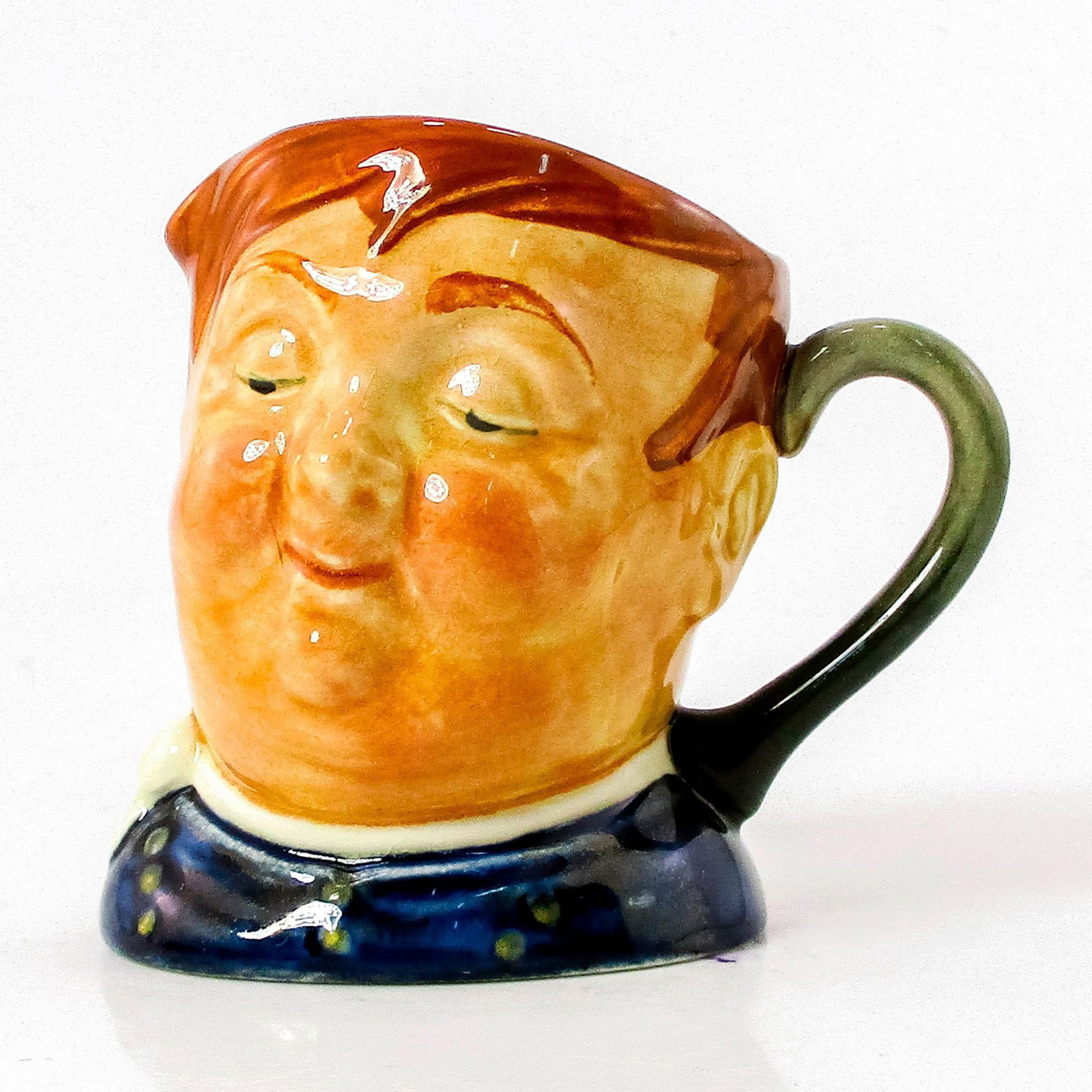 Fat Boy D5840 - Small - Royal Doulton Character Jug: Blue shirt; white scarf. Another wonderful Dickens character , Joe, the Fat Boy, was the lazy glutton who worked as servant to Mr. Wardle in "The Pickwick Papers." Artist: Leslie Harradine and Harry F