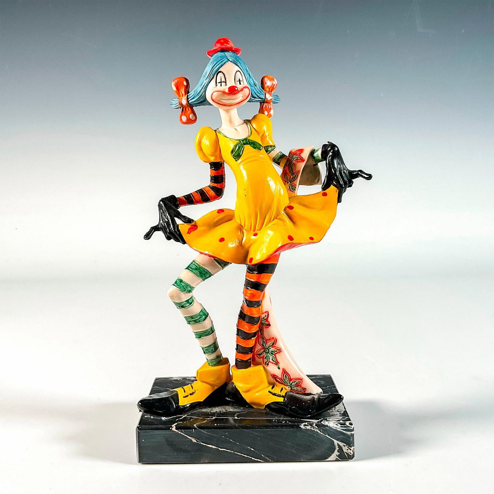 Vintage Depose Italy Female Clown Figurine on Marble: A nice Italian resin figure depicting a female whimsical clown bowing after her performance. Mounted on a genuine Carrara marble base. Depose Italy backstamp. Dimensions: 4.25"L x 2.75"W x 8.75"H Manu