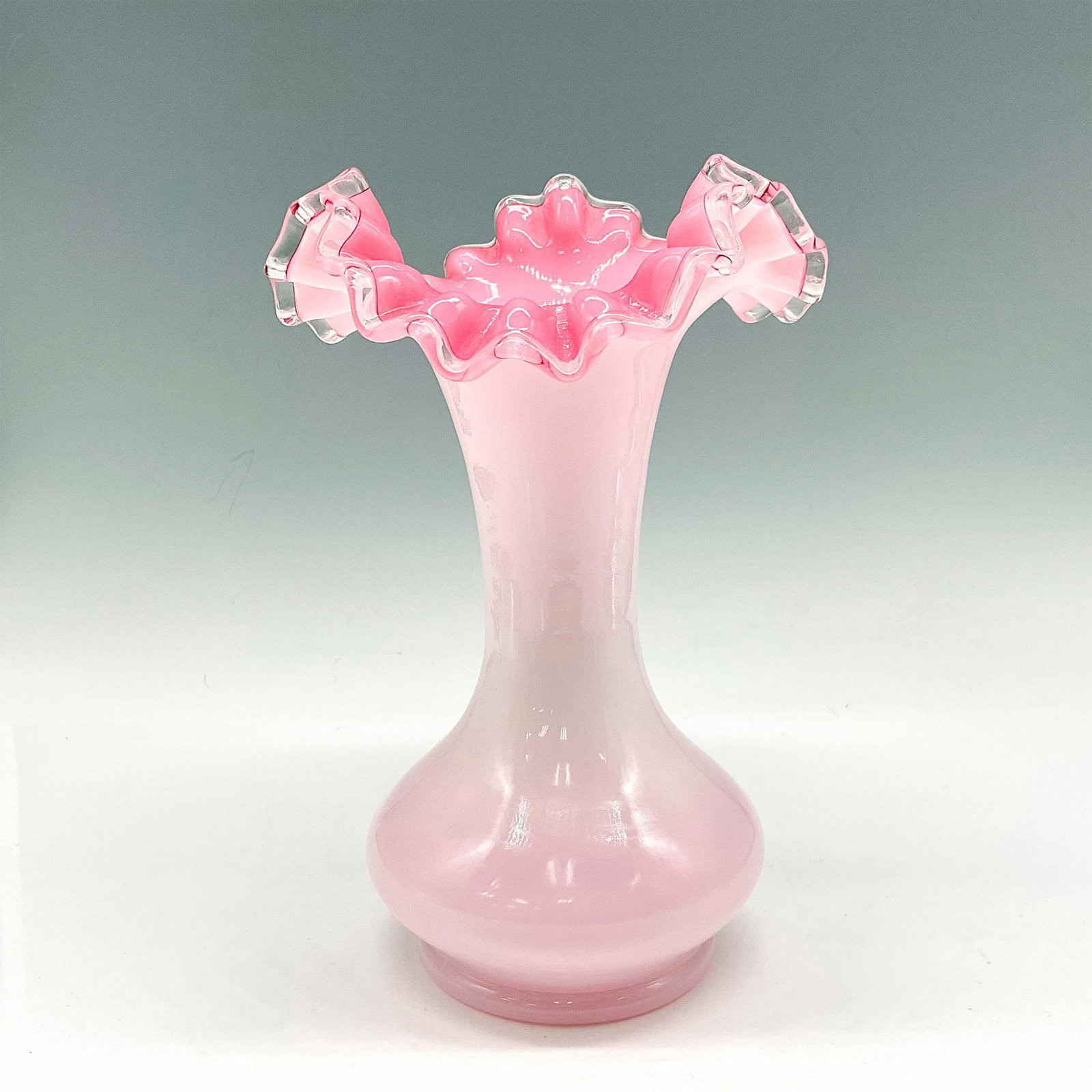 Vintage Fenton Rose Crest Vase: Lovely satin white exterior with rose-pink interior and ruffled, crimped edge. Issued: 20th century Dimensions: 8"H x 5.5" dia. Manufacturer: Fenton Country of Origin: United States