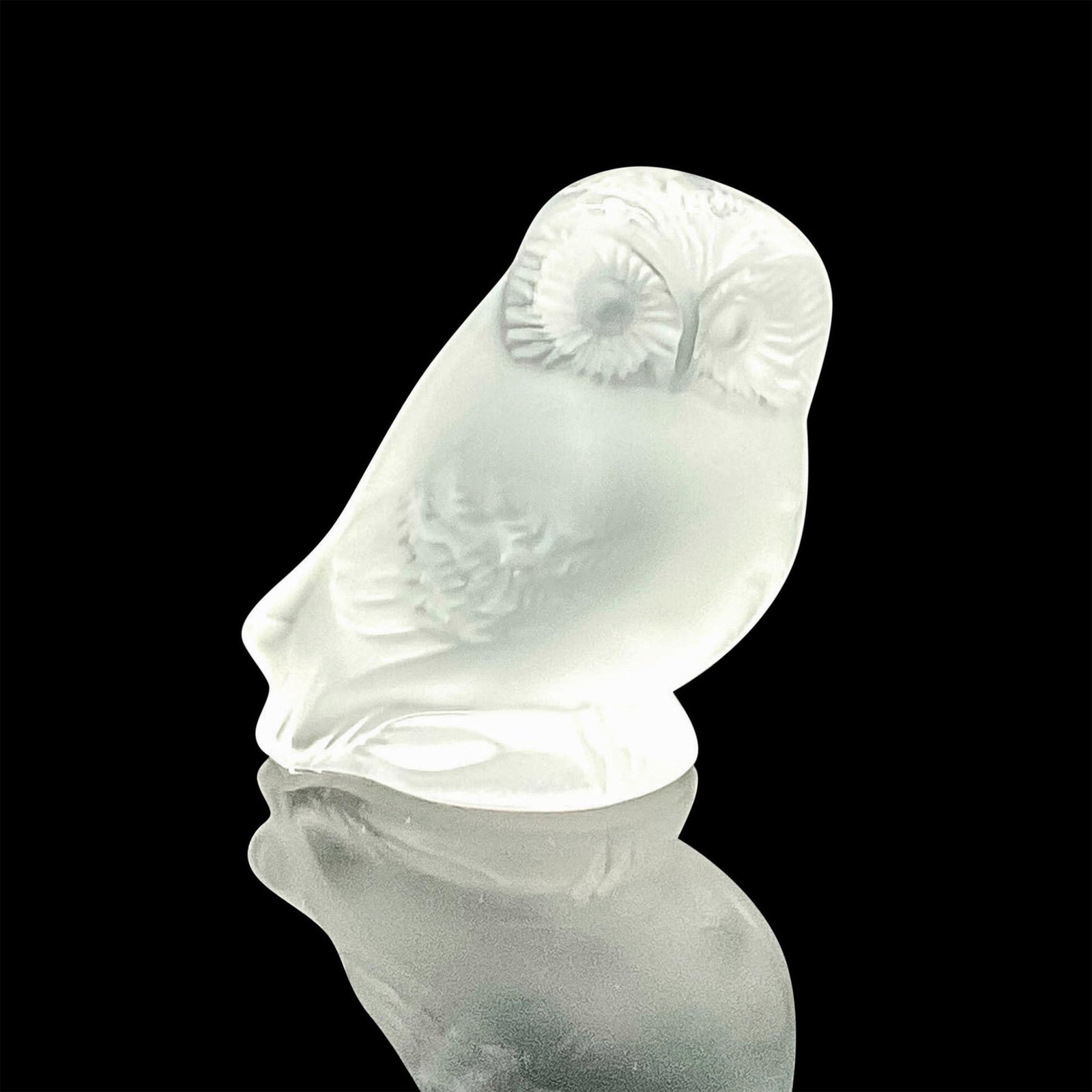 Lalique Crystal Figurine, Nyctal Owl: A satin finished figure modeled as a owl. Lalique France etched on the base. Issued: 20th century Dimensions: 2"L x 1.5"W x 2.25"H Manufacturer: Lalique Country of Origin: France Provenance: Mari