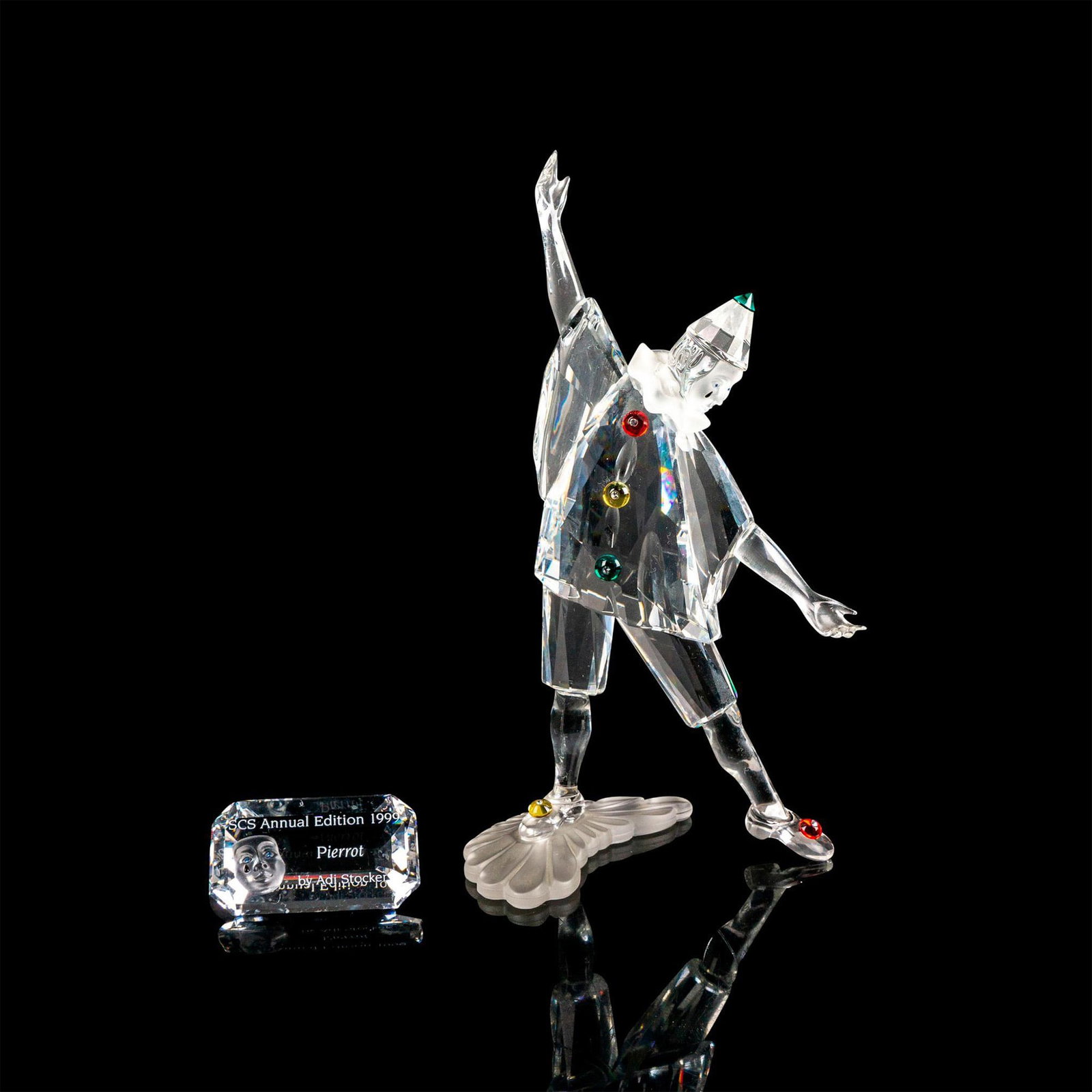 2pc Swarovski SCS Crystal 1999 Figurine and Plaque, Pierrot: First piece of the "Masquerade" trilogy. Figure made with clear, frosted, and color crystal. Includes SCS Annual Edition 1999 Pierrot plaque. Swarovski etch marks on the bases. Certificate of Authenti
