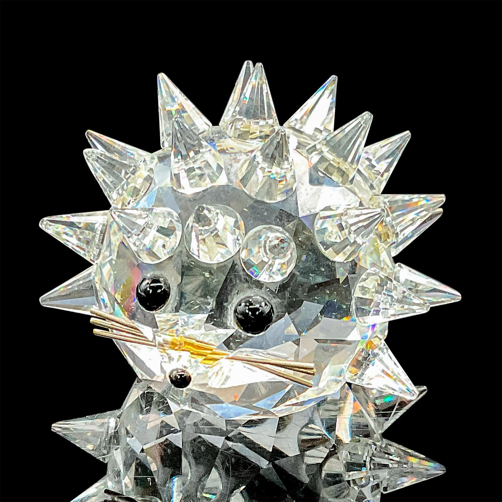 Swarovski Crystal Figurine, Hedgehog: This Swarovski hedgehog was part of the When We Were Young theme group. Distinguished from the other Swarovski hedgehogs because of its facetted spines. His face shows metal whiskers and Jet crystal e