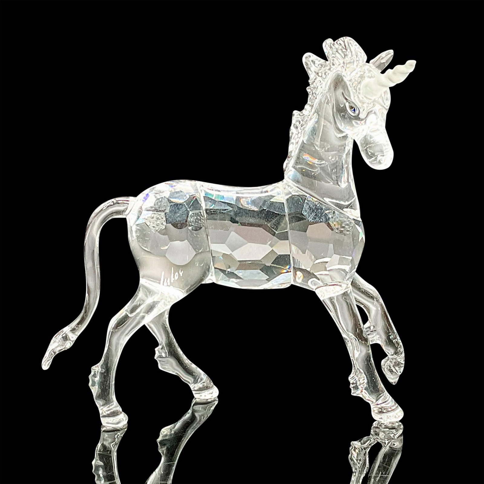 Swarovski Crystal Figurine, Majestic Unicorn: This enchanting figurine, a part of the Fables and Tales collection, is made from clear crystal with a frosted horn, creating a beautiful contrast and enhancing its mystical appeal. Featuring faceted 