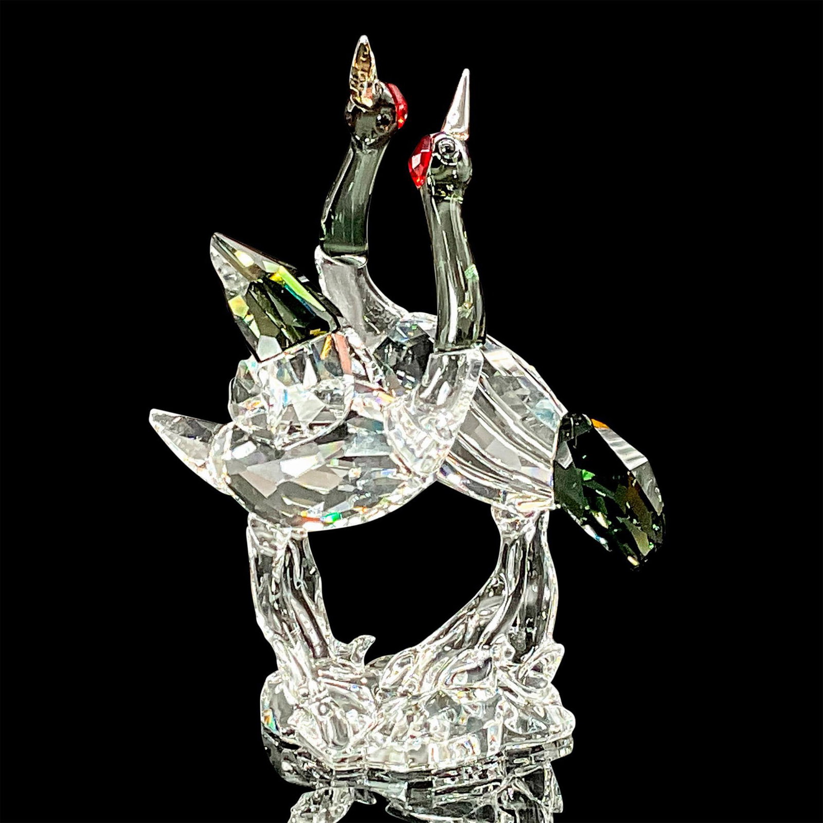 Swarovski SCS Crystal Figurine, Red Crowned Cranes: This Swarovski crystal Red Crowned Crane figurine was only available to SCS members and is made of clear crystal with light Siam caps featuring accents in Black Diamond crystal. Swarovski etched backs