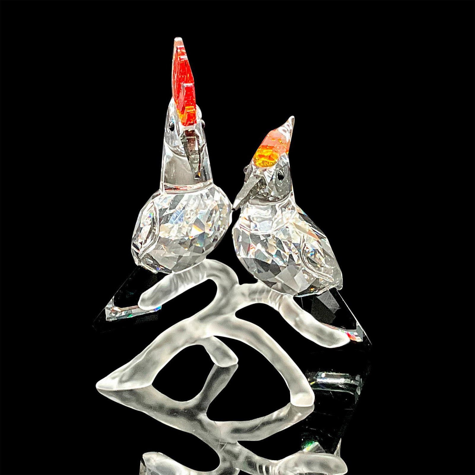 Swarovski Crystal Figurine, Hoopoes 925080: Fully faceted clear crystal body, black Diamond crystal beak, honey brown Topaz crystal crown and Jet-black tail. These colorful Hoopoes bird figurines are part of the Feathered Beauties collection. S
