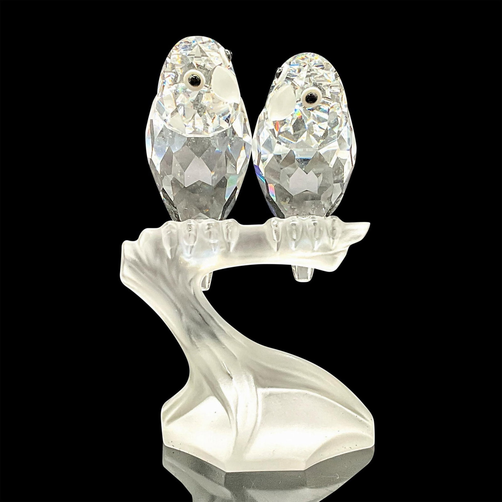 Swarovski Crystal Figurine, Lovebirds Together: Annual Edition, Togetherness, The Lovebirds. This item has its original box with measurements 7.75"H x 7.5" dia. Certificate of Authenticity included. Swarovski etched backstamp. Issued: 1987 Dimensio