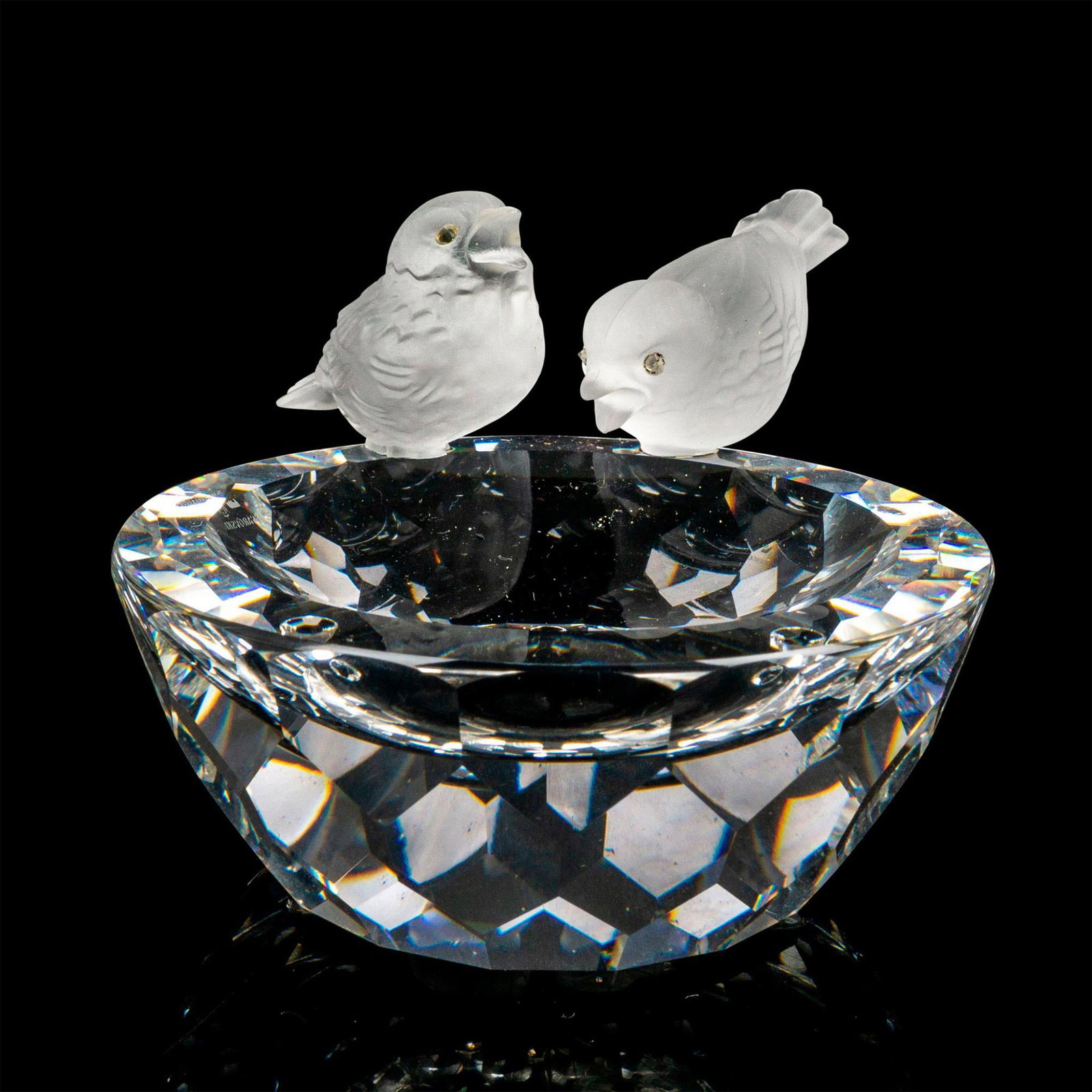 Swarovski Silver Crystal Figurine, Bird Bath: Lead crystal part of the Feathered Beauties collection and is made featuring two frosted crystal birds sitting atop round, faceted bowl. This item has its original box. Artist: Max Schreck Issued: 198
