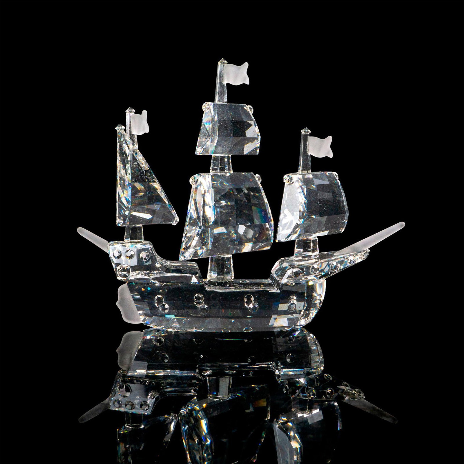 Swarovski Silver Crystal Figurine, Santa Maria: Lead crystal sailing ship made with frosted crystal accents. Swarovski etched backstamp. This item has its original box. Box measures: 7.75"L x 7.5"W x 7.75"H. Artist: Gabriele Stamey Issued: 1991 Dim