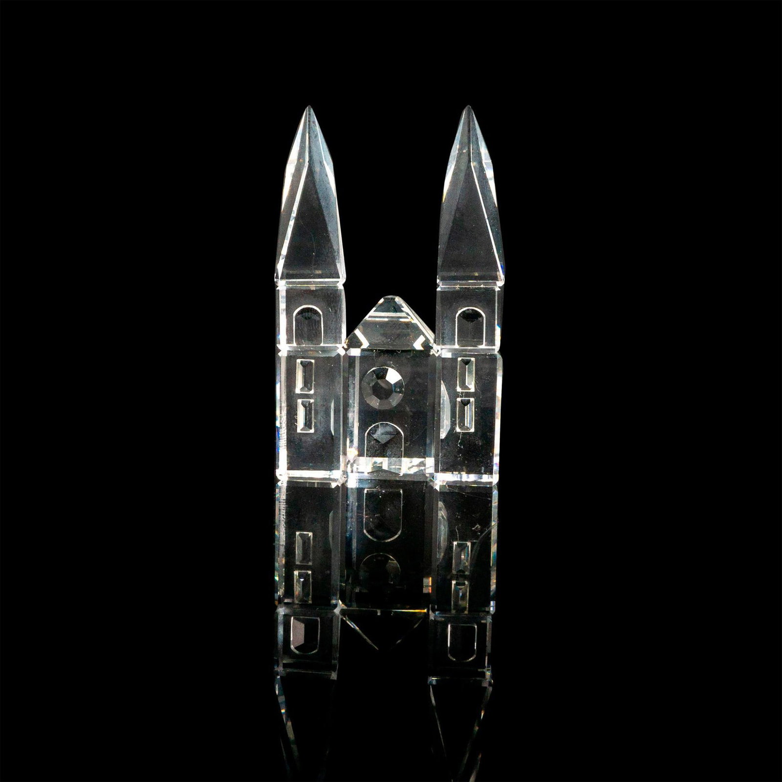 Swarovski Silver Crystal Figurine, Cathedral: Lead crystal part of the Silver Crystal City collection. Swarovski etched backstamp. This item has its original box. Box measures: 3.25"W x 5"H. Artist: Gabriele Stamey Issued: 1990-1994 Dimensions: 1