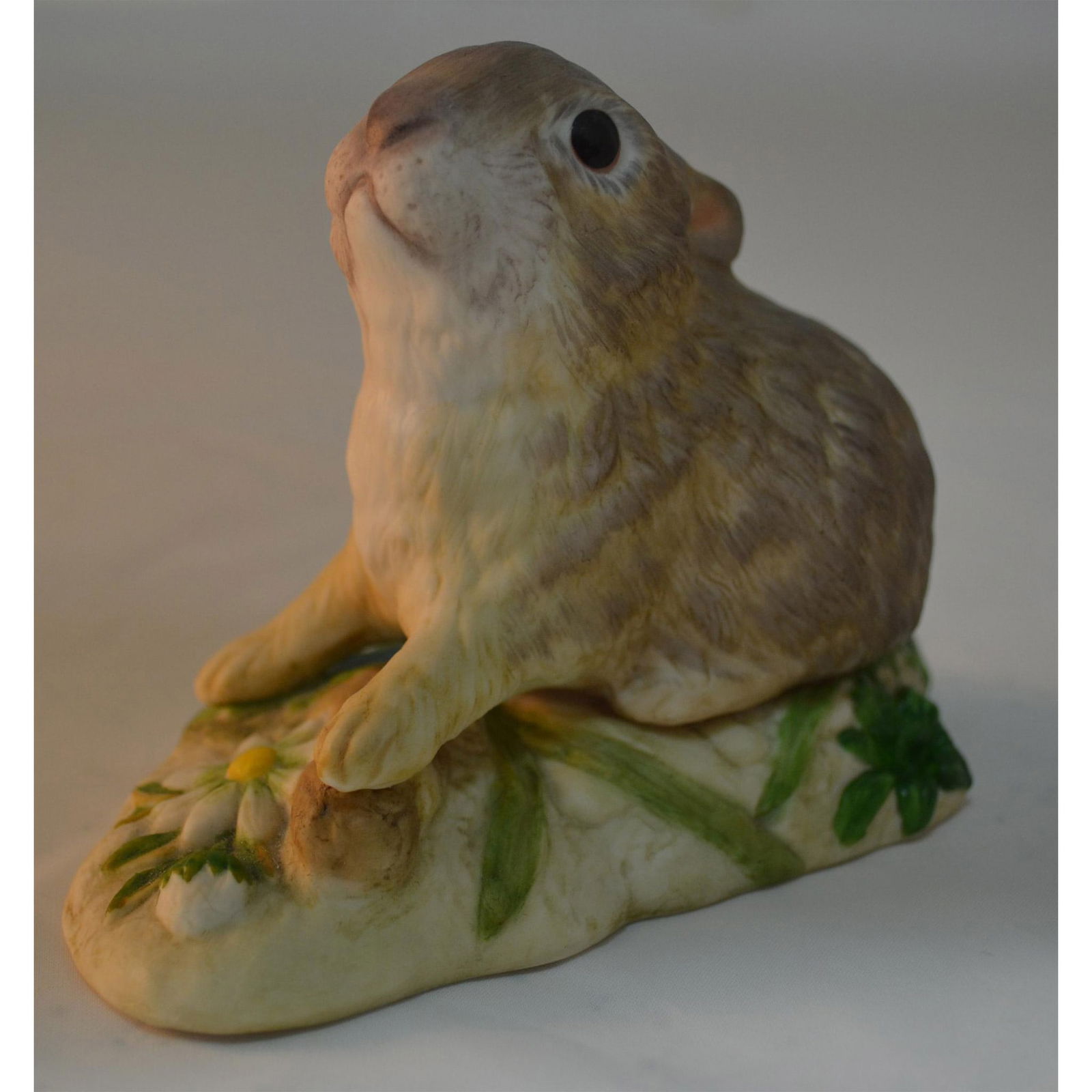 Cybis Porcelain Bunny Muffet Figurine: Bisque Porcelain Decorated, featuring the Sitting Bun-Bun "Muffet". Hand created, hand painted by the Cybis Studio Artists. Issued: 1976. Design # 690. Size: 3.5"h x 5"w x 3"d. Artist: CYBIS Issued: 1