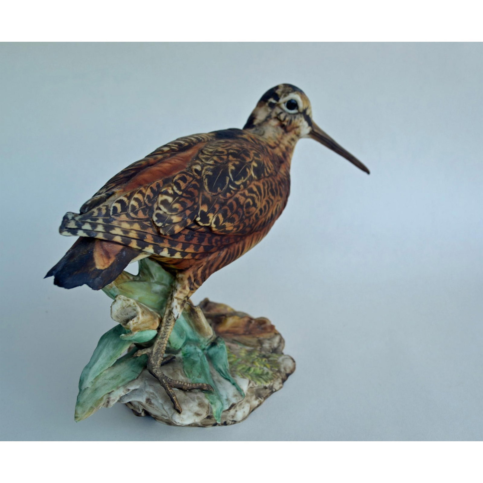 Tay Porcelain Woodcock Bird Figurine: Bisque Porcelain Decorated by Artist Tay, featuring The Woodcock Bird Figurine, Limited to 500. This Woodcock is # 100/500. Made In Italy. Vintage, with Original Tay Tag. Hallmark: Bottom of figurine,