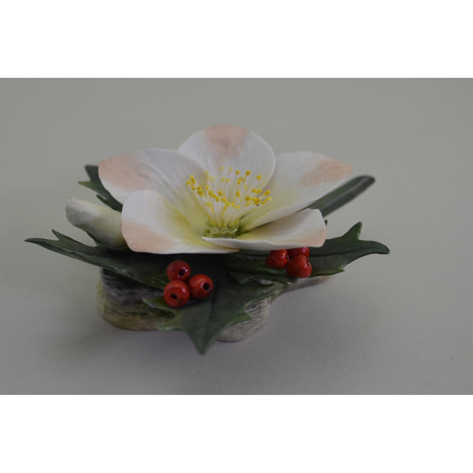 Connoisseur Porcelain Christmas Rose Floral: English Fine Bone China, bisque decorated. Hand created, hand painted by the Connoisseur Studio Artists. Made in England. Size: 1.25"h x 5.25"w x 4.50"d Artist: CONNOISSEUR Issued: 1990's Dimensions: