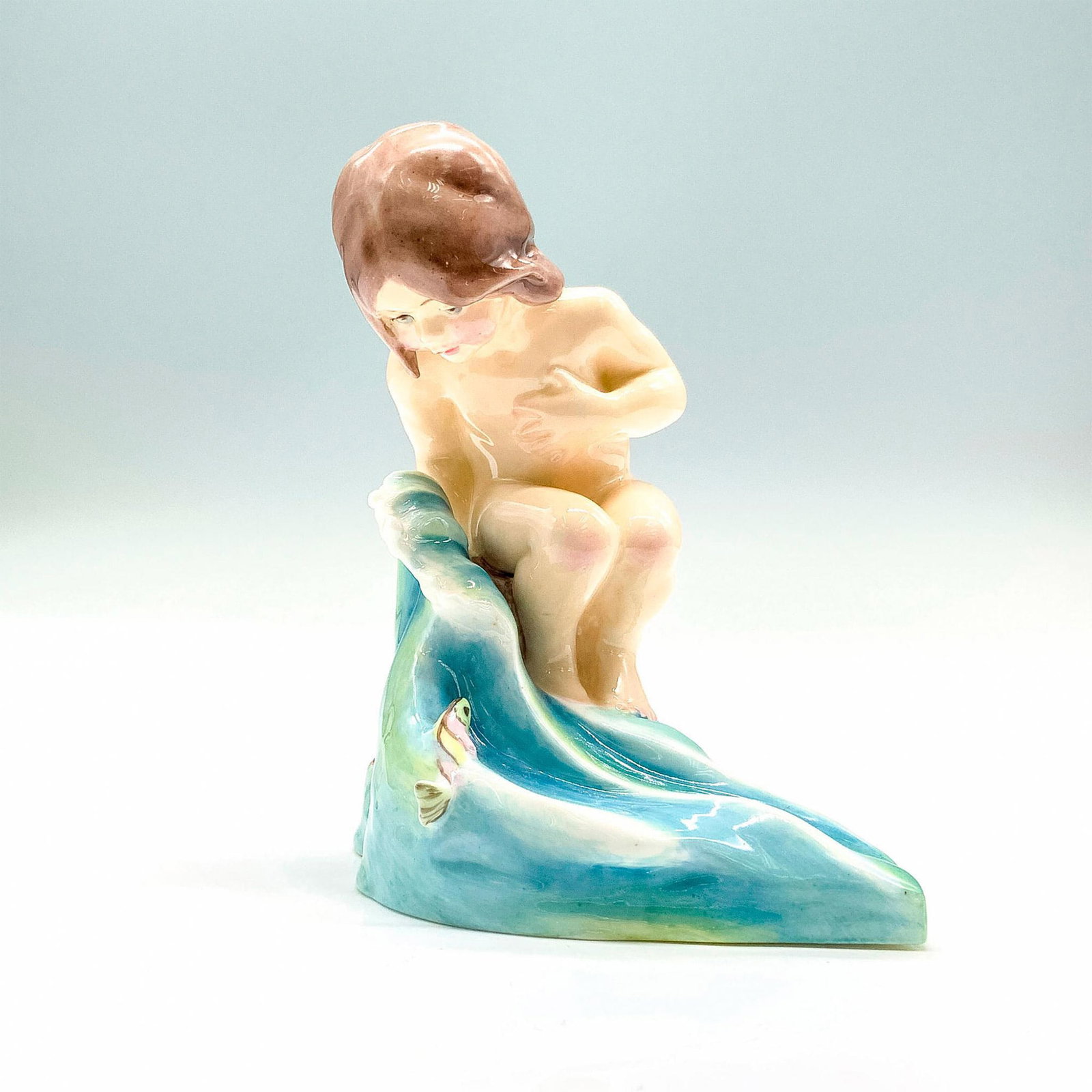 Royal Worcester Porcelain Child Figurine, August 3441: Hand painted glossy Bone China figurine with the Royal Worcester backstamp on the bottom. Artist: F.G. Doughty Dimensions: 4.25"L x 3"W x 4.5"H Manufacturer: Royal Worcester Country of Origin: England