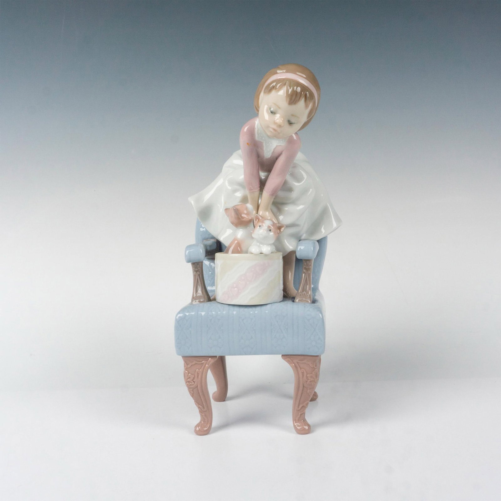 Purr-fect Companions 1006512 - Lladro Porcelain Figurine: Glossy finish; Lladro backstamp. Box measures: 9.5"L x 8"W x 13.25"H. Artist: Joan Coderch Issued: 1998 - 1998 Dimensions: 9.5"H x 5"W Manufacturer: Lladro Country of Origin: Spain