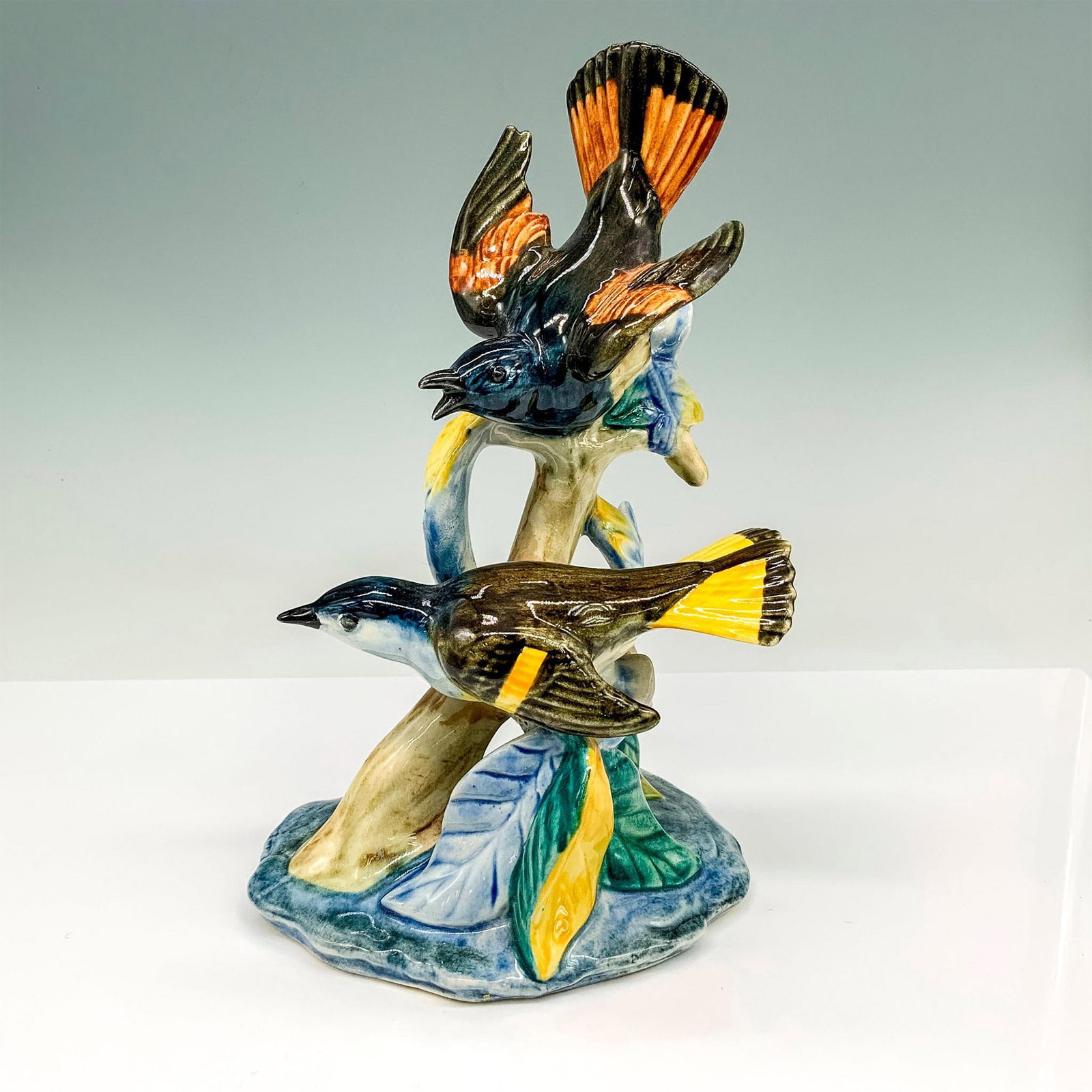 Stangl Pottery Bird Figurine, Double Red Starts 3490: Colorful birds with a glossy finish. Stangl mark and artist initials RV are on the bottom. Dimensions: 5.75"L x 4.5"W x 9"H Manufacturer: Stangl Pottery Country of Origin: United States