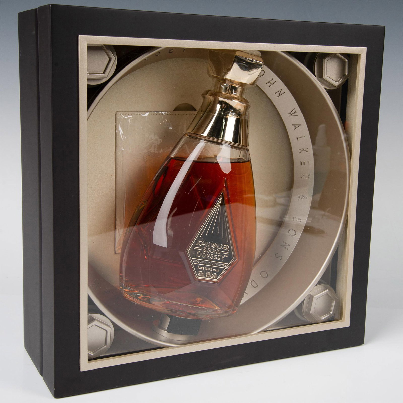 John Walker & Sons Odyssey Rare Triple Malt Scotch Whisky: Odyssey is made from three rare single malts that are blended and married together in oak casks creating a deep russet-red hue with a rich, smooth flavor. Winner of numerous awards this exceptional 43