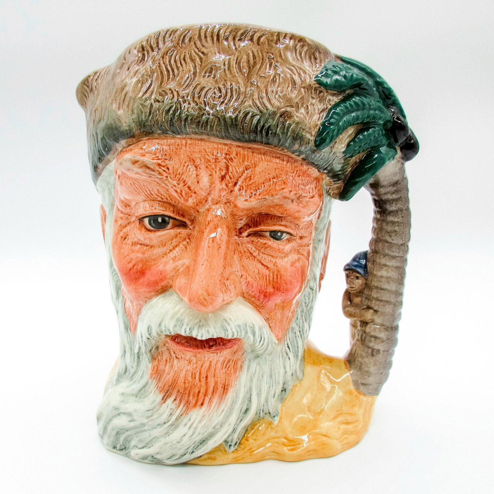 Robinson Crusoe D6532 (with Footprint) - Large - Royal Doulton Character Jug: Variation One: With footprint on shoulder. Brown and green coloration. Series: Characters from Literature. Royal Doulton backstamp. Artist: Max Henk Issued: 1960 - 1982 Dimensions: 7.5"H Manufacturer: