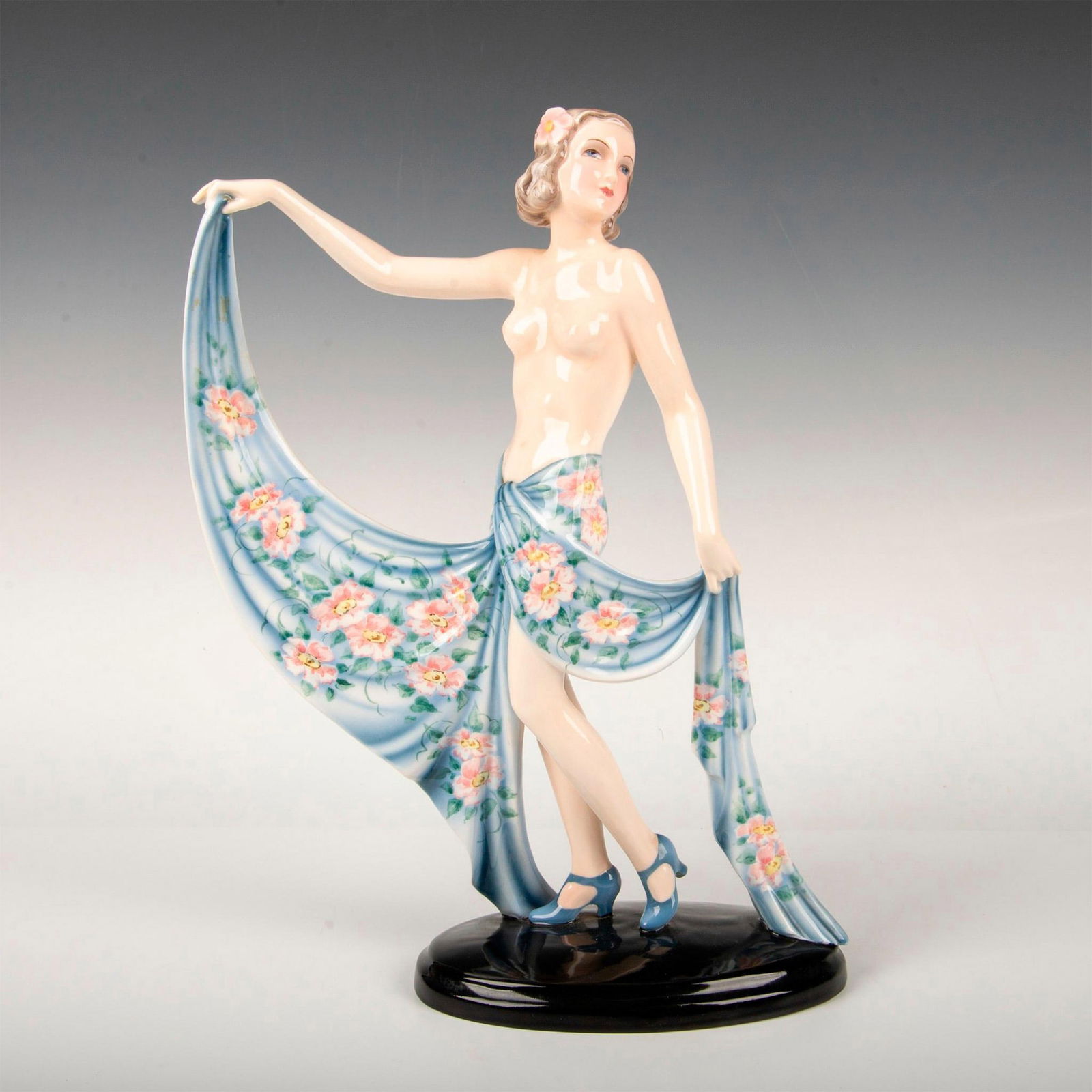 Goldscheider Art Deco Figure, Vienna Dancer: Model 8461, depicting a half nude dancer in a highly detailed shawl, holding the ends as she pose. Embossed model no. to bottom. Goldscheider backstamp. Artist: Josef Lorenzl Issued: 1939 Dimensions:
