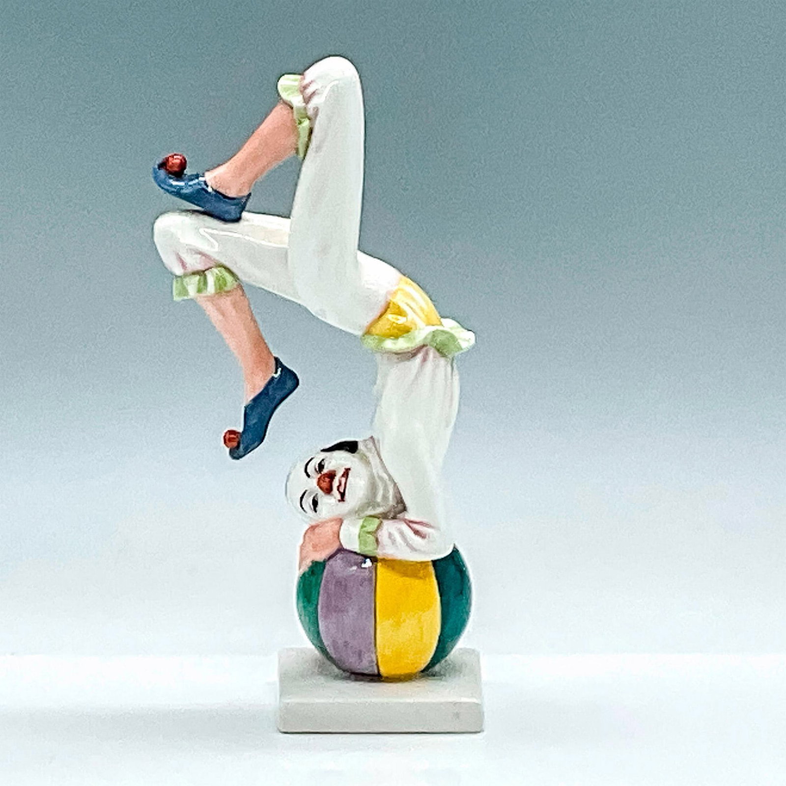 Tumbling HN3283 - Royal Doulton Figurine: Artist: Douglas V. Tootle Issued: 1990 - 1994 Dimensions: 8.75"H Manufacturer: Royal Doulton Country of Origin: England