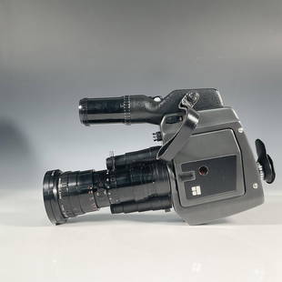 8pc Vintage Beaulieu 5008 S Camera with Accessories: First introduced in 1974, a super 8mm film dual speed professional camera with SLR function and Angenieux zoom lens. Includes an incredible looking, heavily built chromed, cabled microphone, crystal