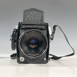 6pc Kowa Super 66 6x6 SLR Camera with Accessories: Introduced in 1968 this vintage Super 66 is a SLR medium format camera for 6x6 cm pictures on 120 film. It includes attached a Kowa 1:2.8/85mm lens for a 67mm filter, and a BDB UV/Haze 67mm filter.