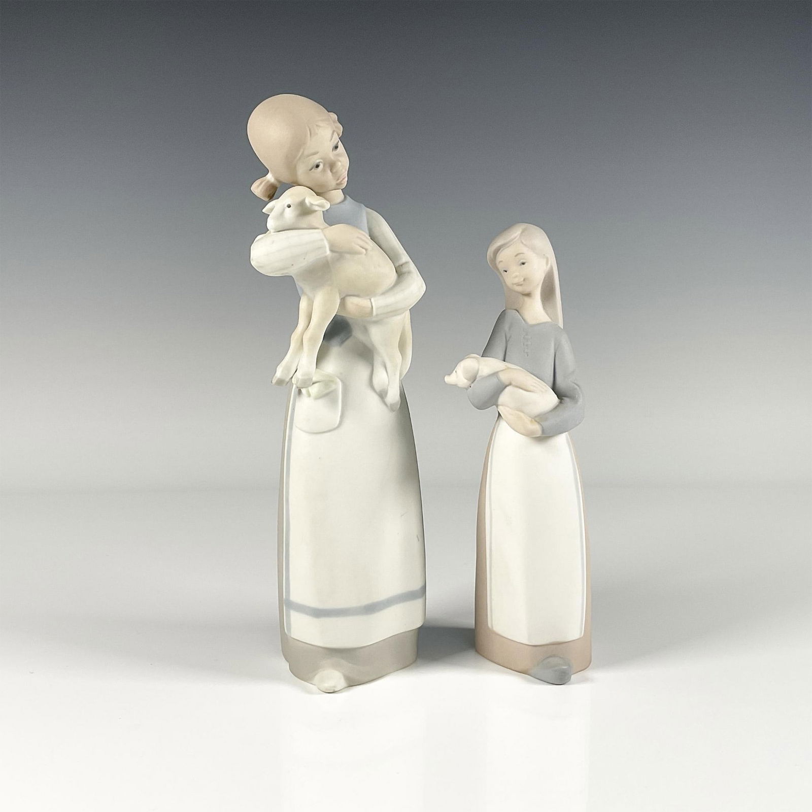 2pc Lladro Porcelain Figurines (1 of 3)