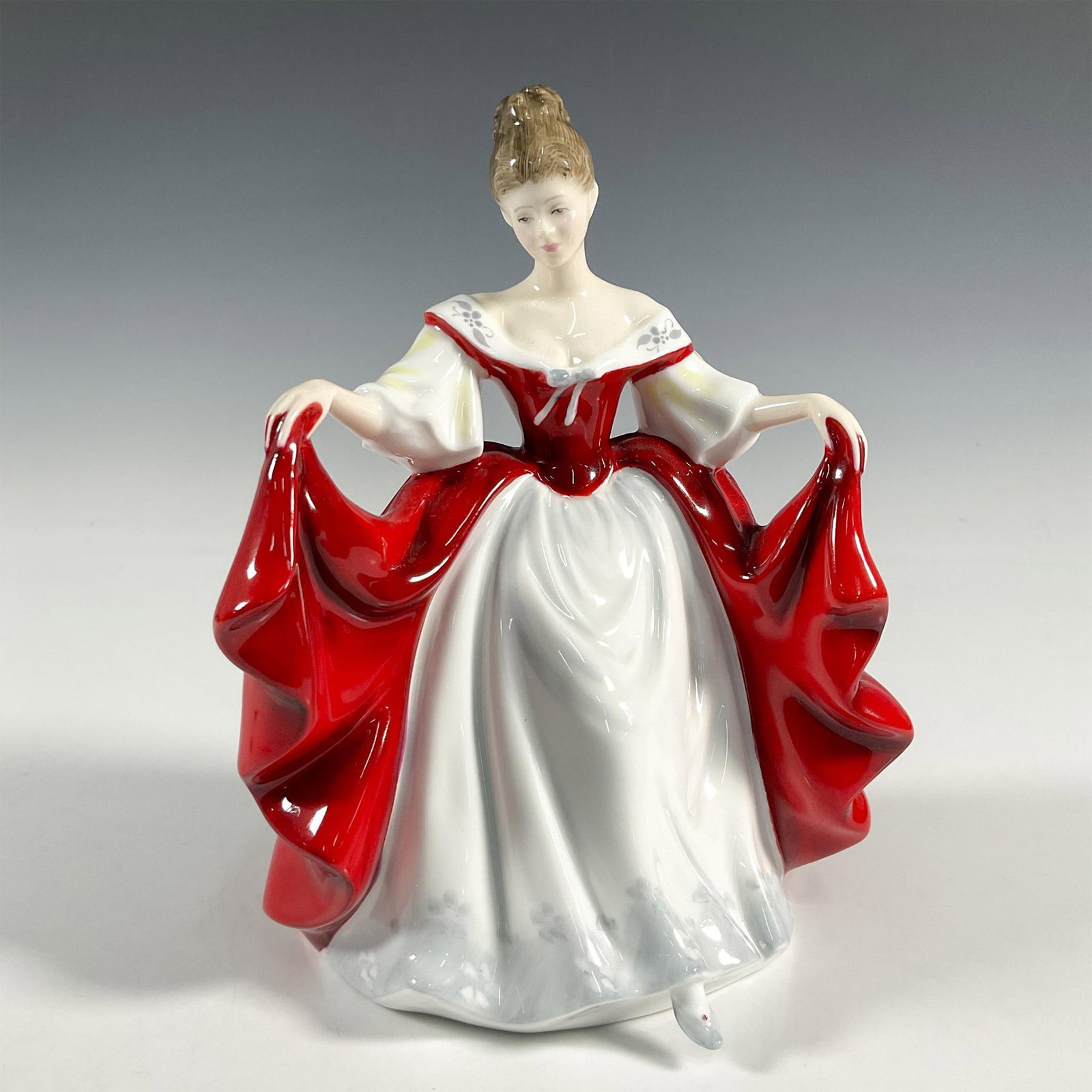Sara HN2265 - Royal Doulton Figurine: Artist: Peggy Davies Issued: 1981 - 2000 Dimensions: 7.5"H Manufacturer: Royal Doulton Country of Origin: England
