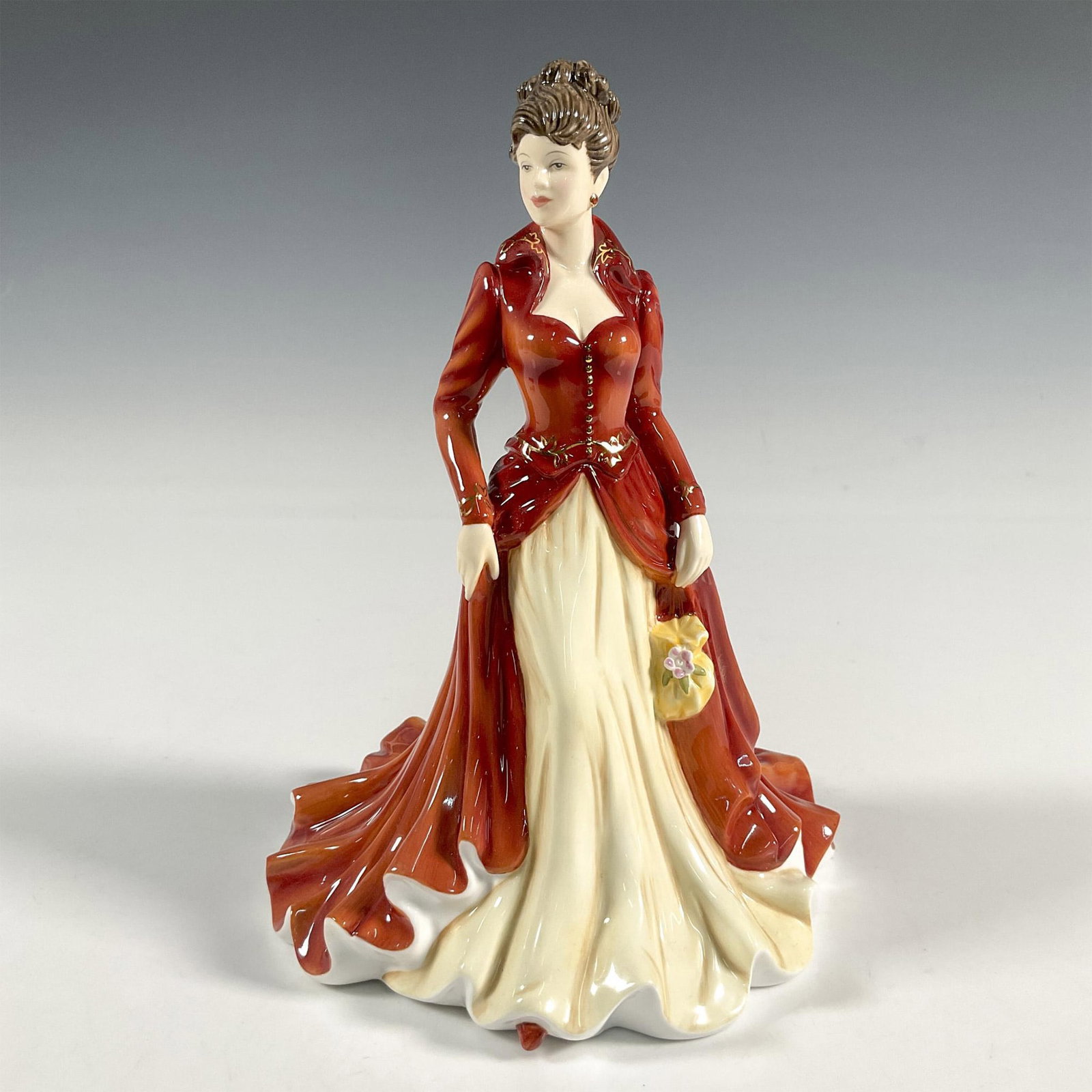 Sentiments Collection Loving You HN5556 - Royal Doulton Figurine: Artist: Doulton Studios Issued: 2012 Dimensions: 8.75"H Manufacturer: Royal Doulton Country of Origin: England