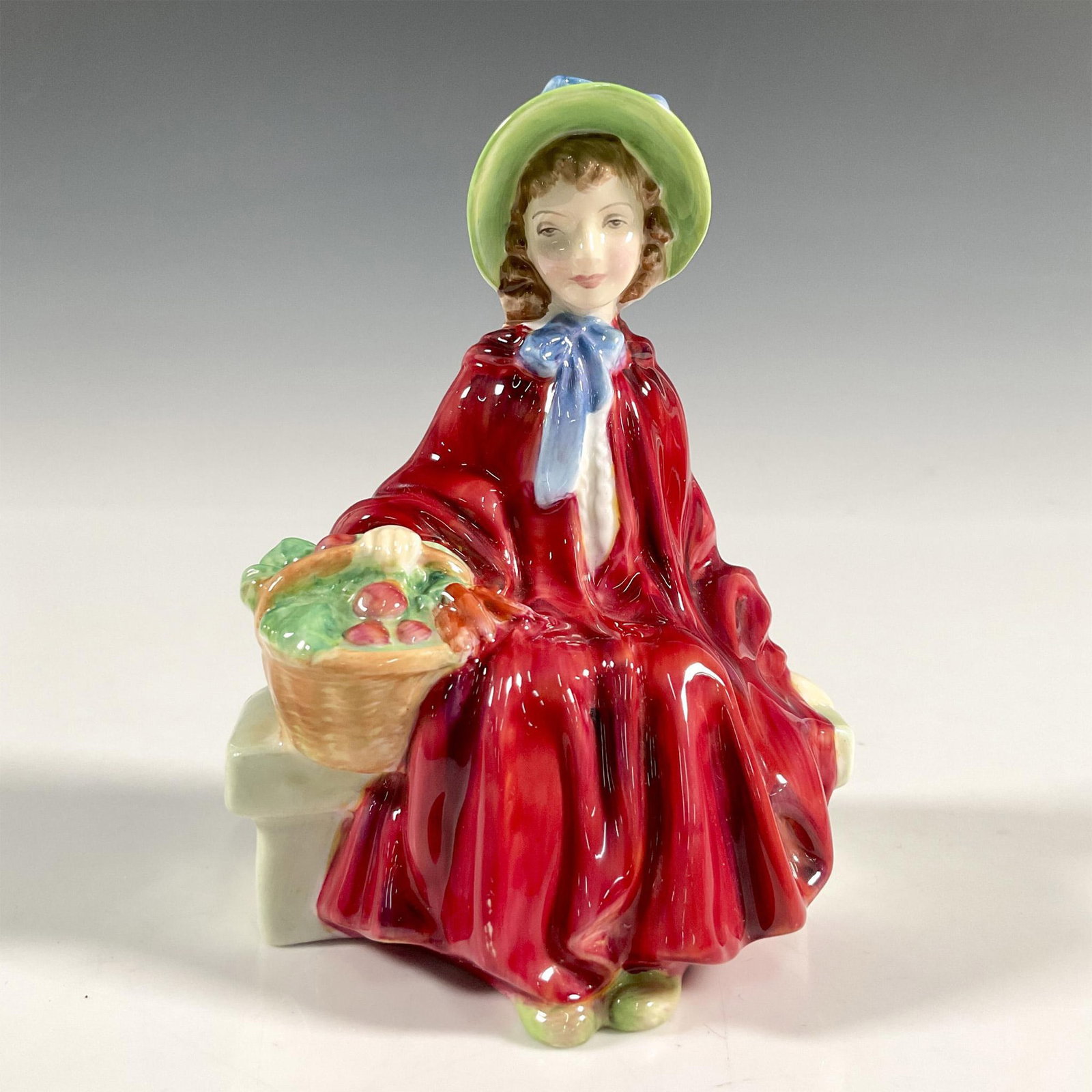 Linda - HN2106 - Royal Doulton Figurine: Artist: Leslie Harradine Issued: 1953 - 1976 Dimensions: 4.75"H Manufacturer: Royal Doulton Country of Origin: England