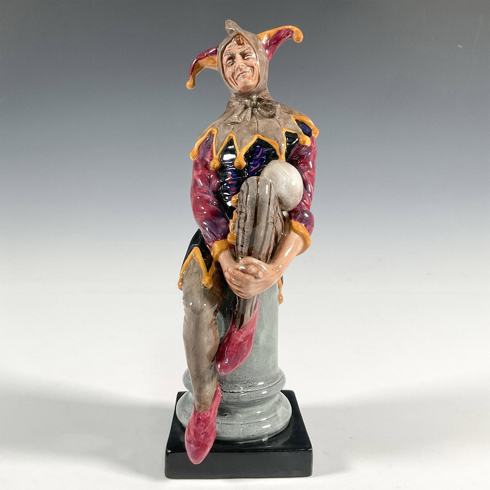 Jester - HN2016 - Royal Doulton Figurine: Artist: Charles J. Noke Issued: 1949 - 1997 Dimensions: 10"H Manufacturer: Royal Doulton Country of Origin: England