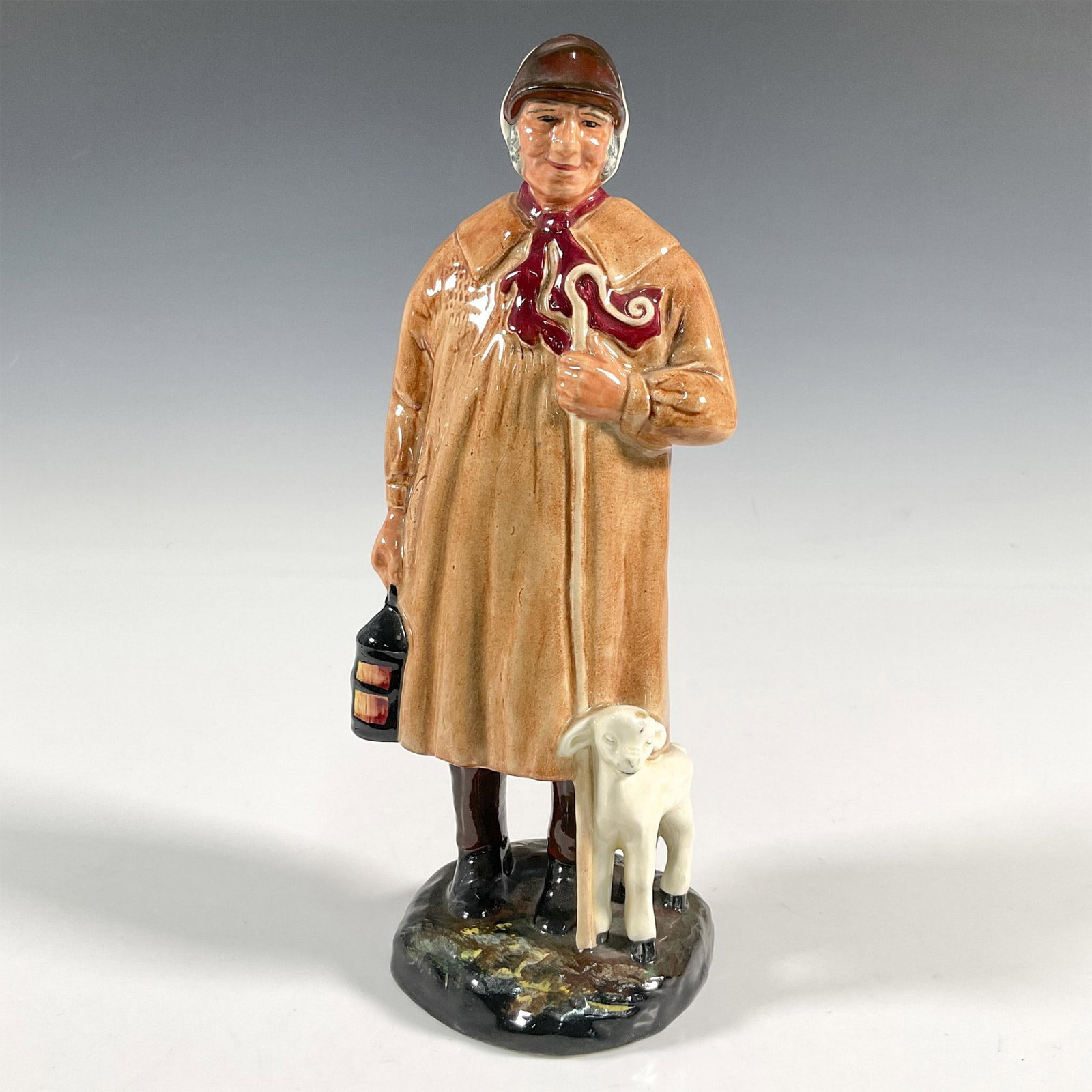 Shepherd - HN1975 - Royal Doulton Figurine: Artist: Henry Fenton Issued: 1945 - 1975 Dimensions: 8.5"H Manufacturer: Royal Doulton Country of Origin: England