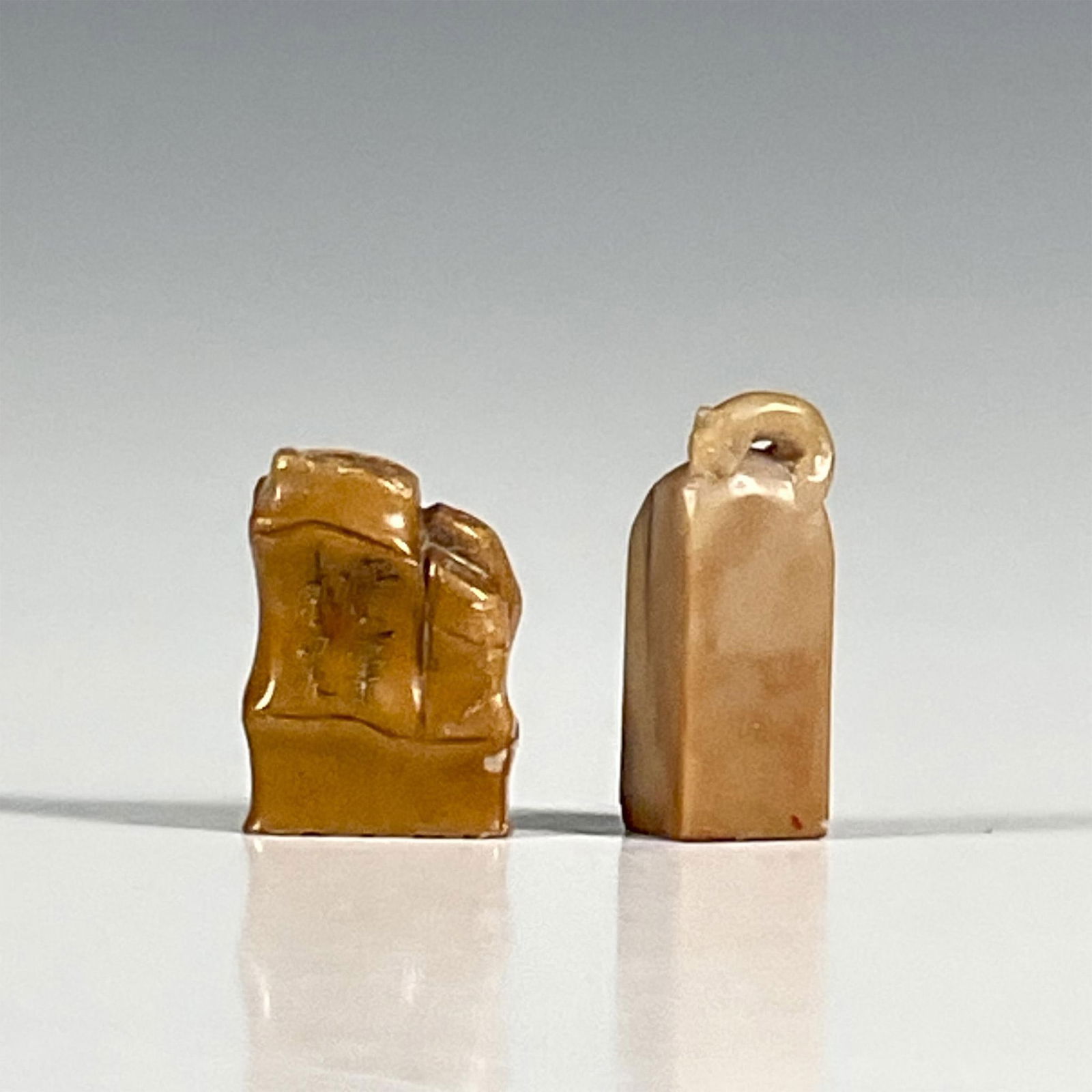 2pc Antique Chinese Soapstone Seals: 2 beautiful carved stone seals. One with a squirrel on top, and the other is formed as bamboo stalks. Seal 1: 0.5"L x 0.5"W x 1.5"H. Seal 2: 0.75"L x 0.5"W x 1.25"H. Country of Origin: China