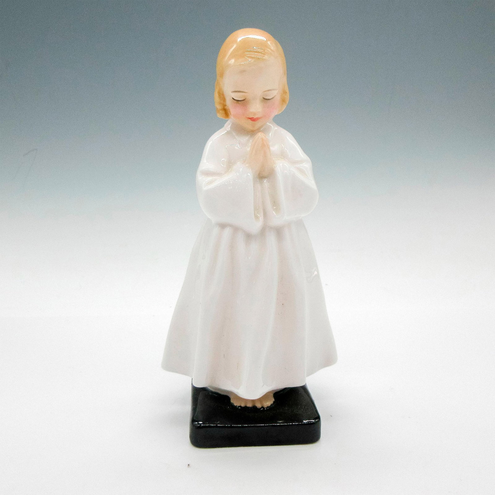 Bedtime HN1978 - Royal Doulton Bone China Figurine: Part of Harradine Child Classics series. Glazed figural at bedtime prayer moment. Royal Doulton backstamp. Artist: Leslie Harradine Issued: 1945 - 1997 Dimensions: 3"L x 2.5"W x 6"H Manufacturer: Roya