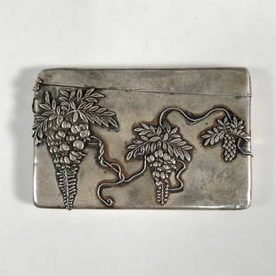 Japanese Silver Card Holder With Embossed Grape Vine: Japanese silver, square form card holder. Carefully detailed all around with Grape vine foliage in relief. Hallmarked character marks. Weight: Dimensions: 4"W x 2.5"H