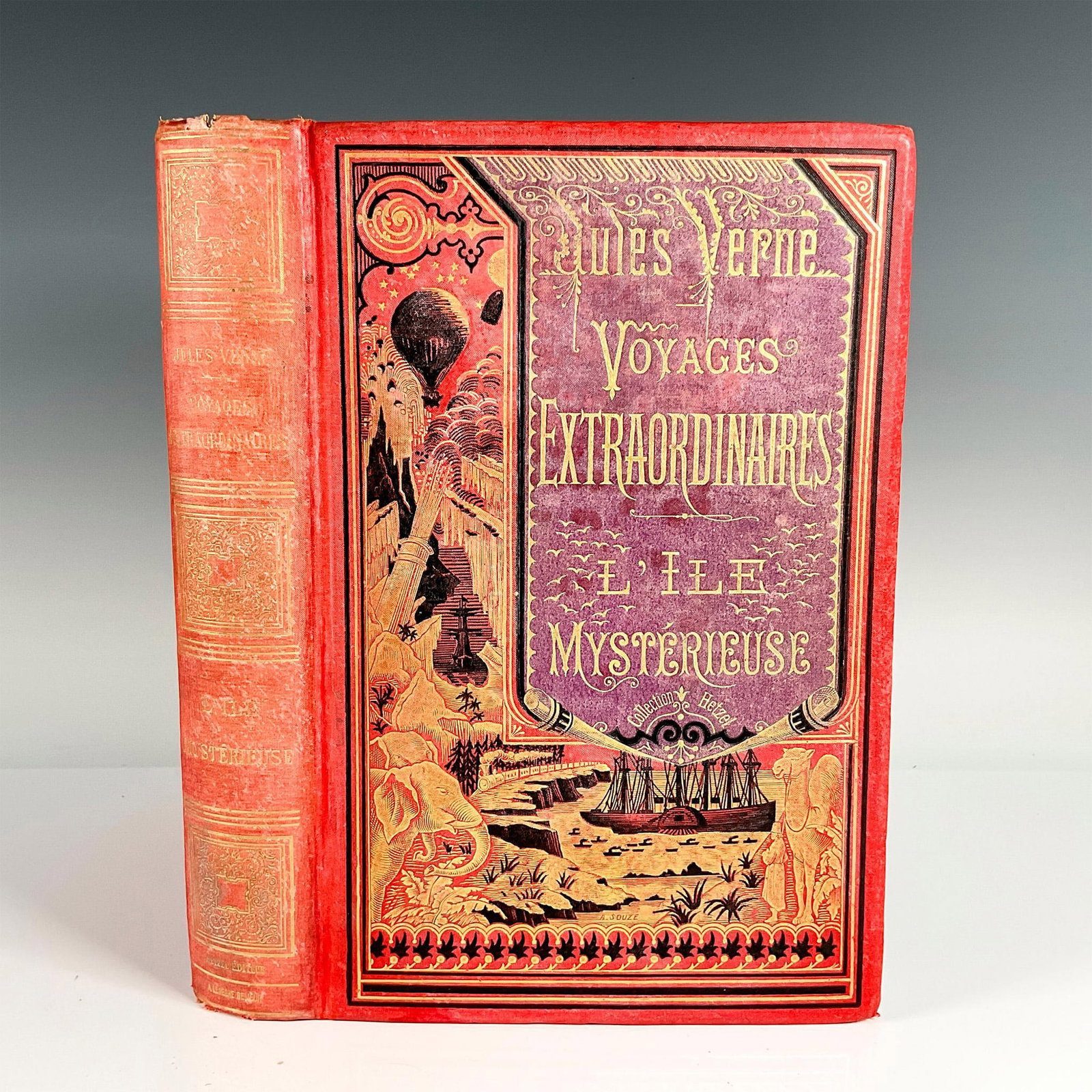 Jules Verne, L'ile Mysterieuse, A La Banniere, Red Cover: Single volume of Hetzel's French edition A La Banniere (Bicolore au Ballon), type 7, red and lilac cover, from the Voyages Extraordinaires series by Jules Verne. It includes the novel L'Ile Mysterieus
