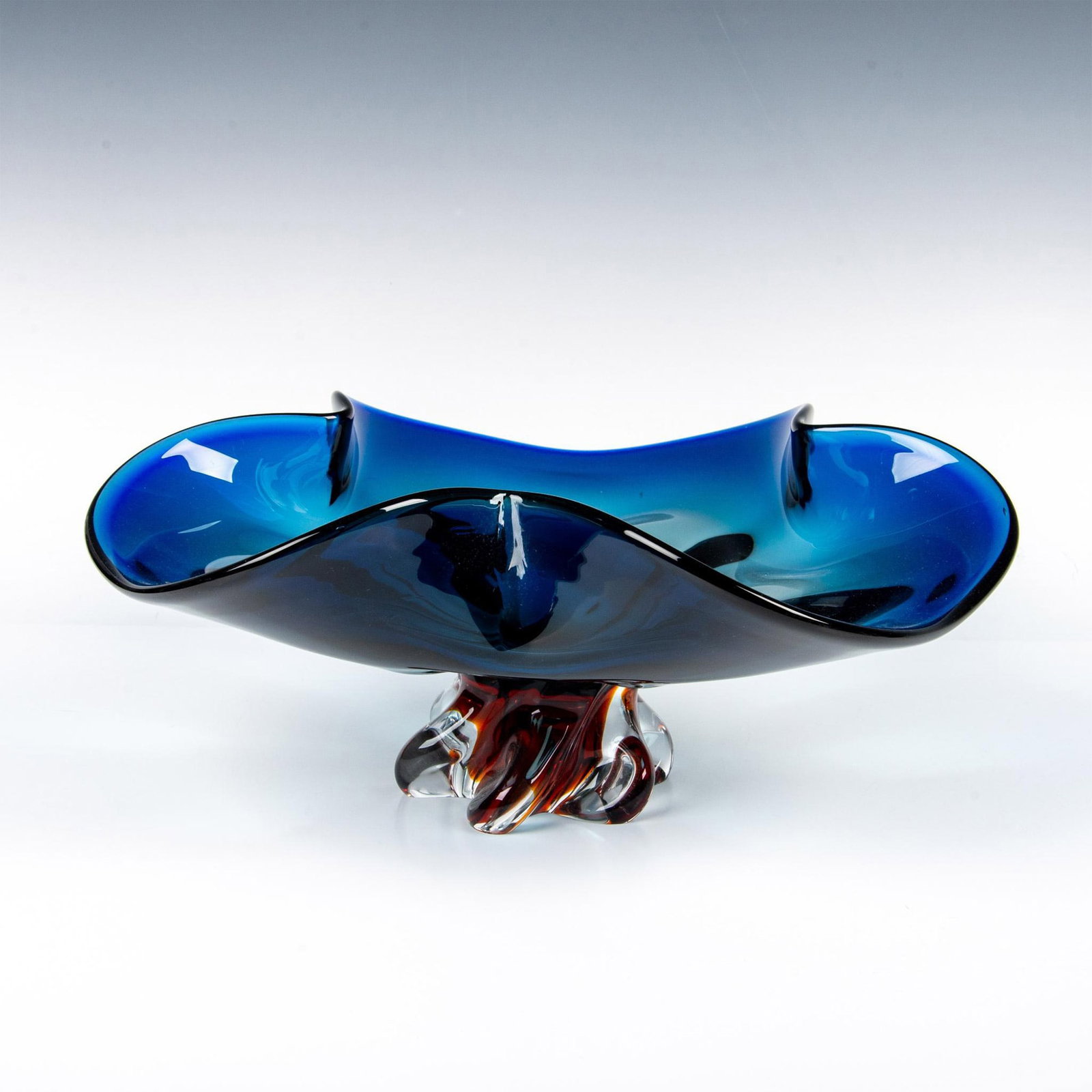 Egermann Czech Republic Art Glass Bowl: Lovely, fluid vibrant blue, green bowl with clear and amber twisted base. Egermann sticker and etched on base. Issued: 20th century Dimensions: 7"H x 15" dia. Manufacturer: Egermann Country of Origin: